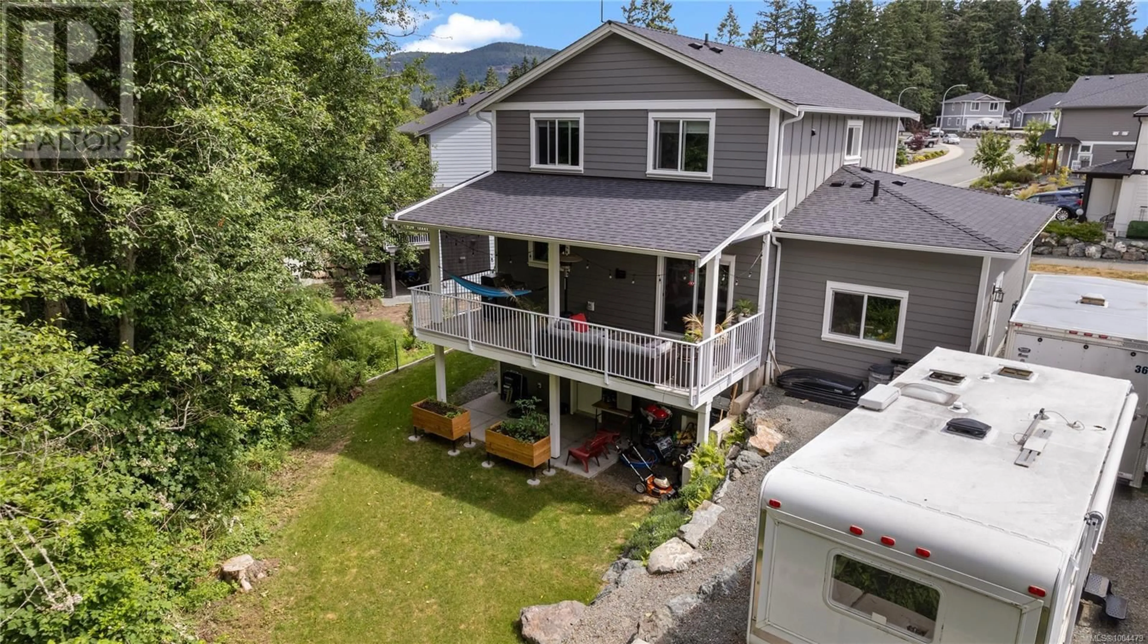 A pic from outside/outdoor area/front of a property/back of a property/a pic from drone, mountain view for 2052 ERNEST LANE, Duncan British Columbia V9L5R4