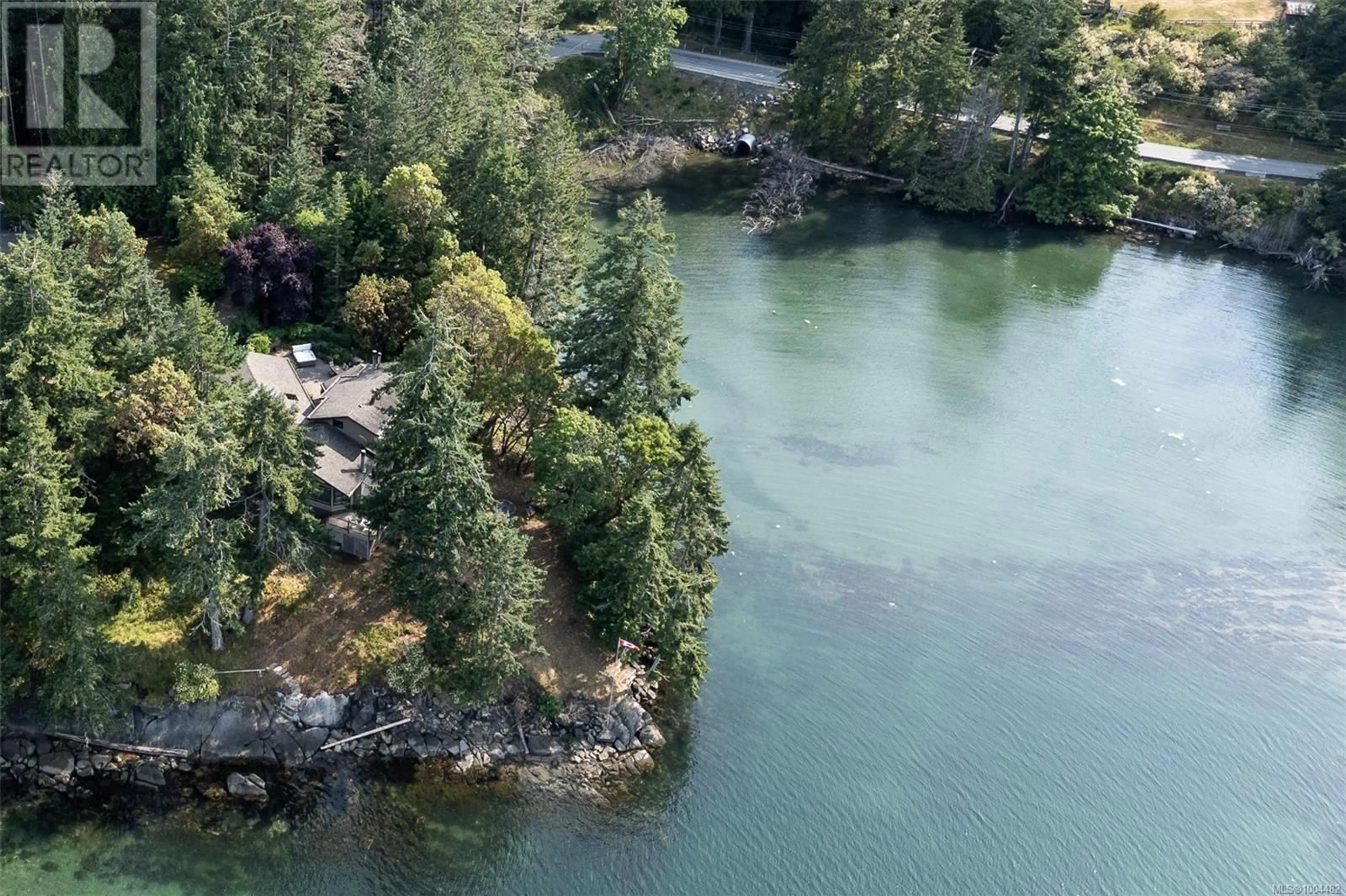 A pic from outside/outdoor area/front of a property/back of a property/a pic from drone, water/lake/river/ocean view for 1 - 835 STURDIES BAY ROAD, Galiano Island British Columbia V0N0E9