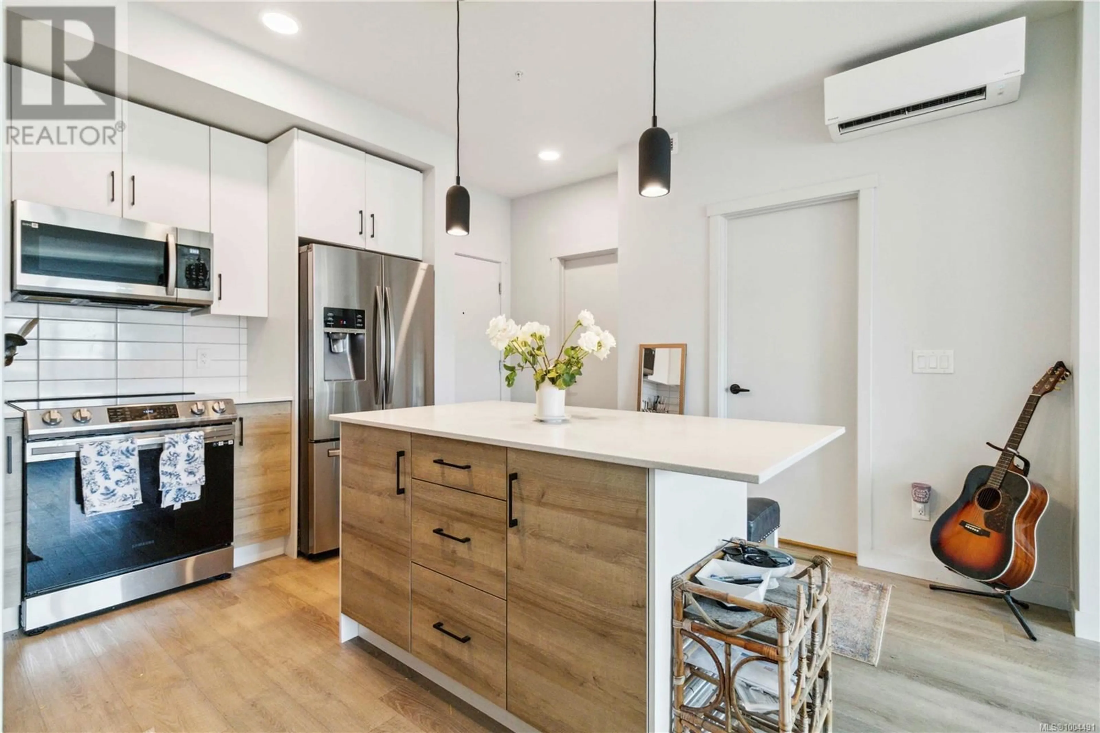 Open concept kitchen, unknown for 303 - 2465 GATEWAY ROAD, Langford British Columbia V9B6R1