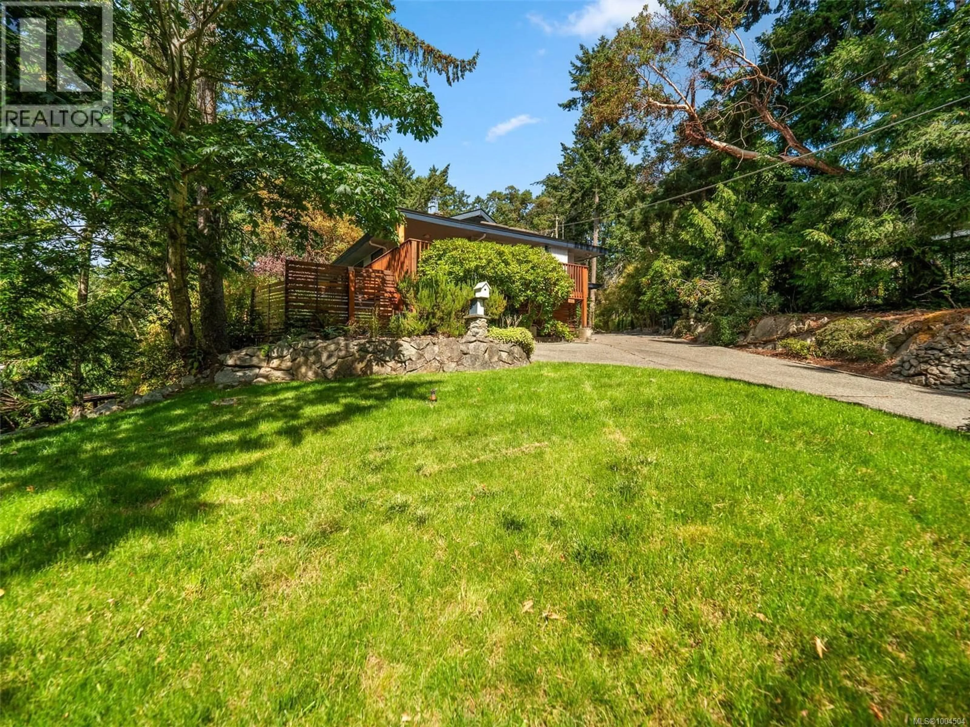 A pic from outside/outdoor area/front of a property/back of a property/a pic from drone, forest/trees view for 2660 MACDONALD DRIVE EAST, Saanich British Columbia V8N1X9