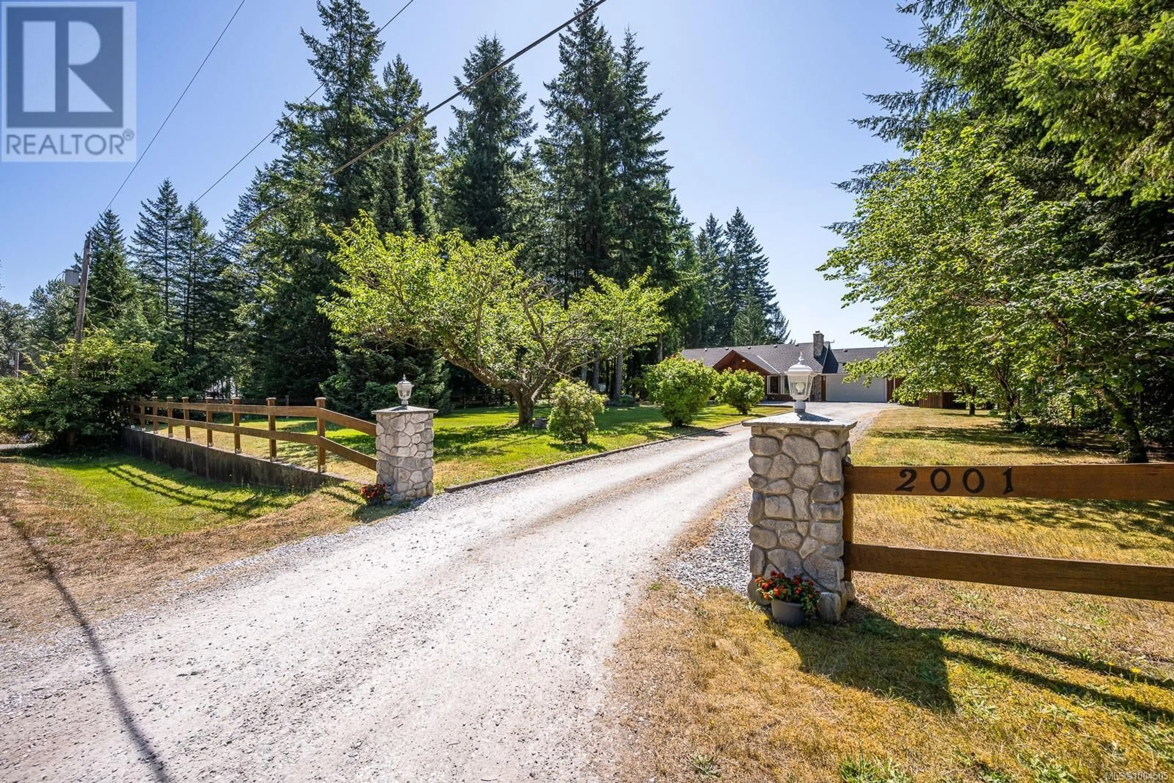A pic from outside/outdoor area/front of a property/back of a property/a pic from drone, unknown for 2001 DZINI ROAD, Black Creek British Columbia V9J1H1