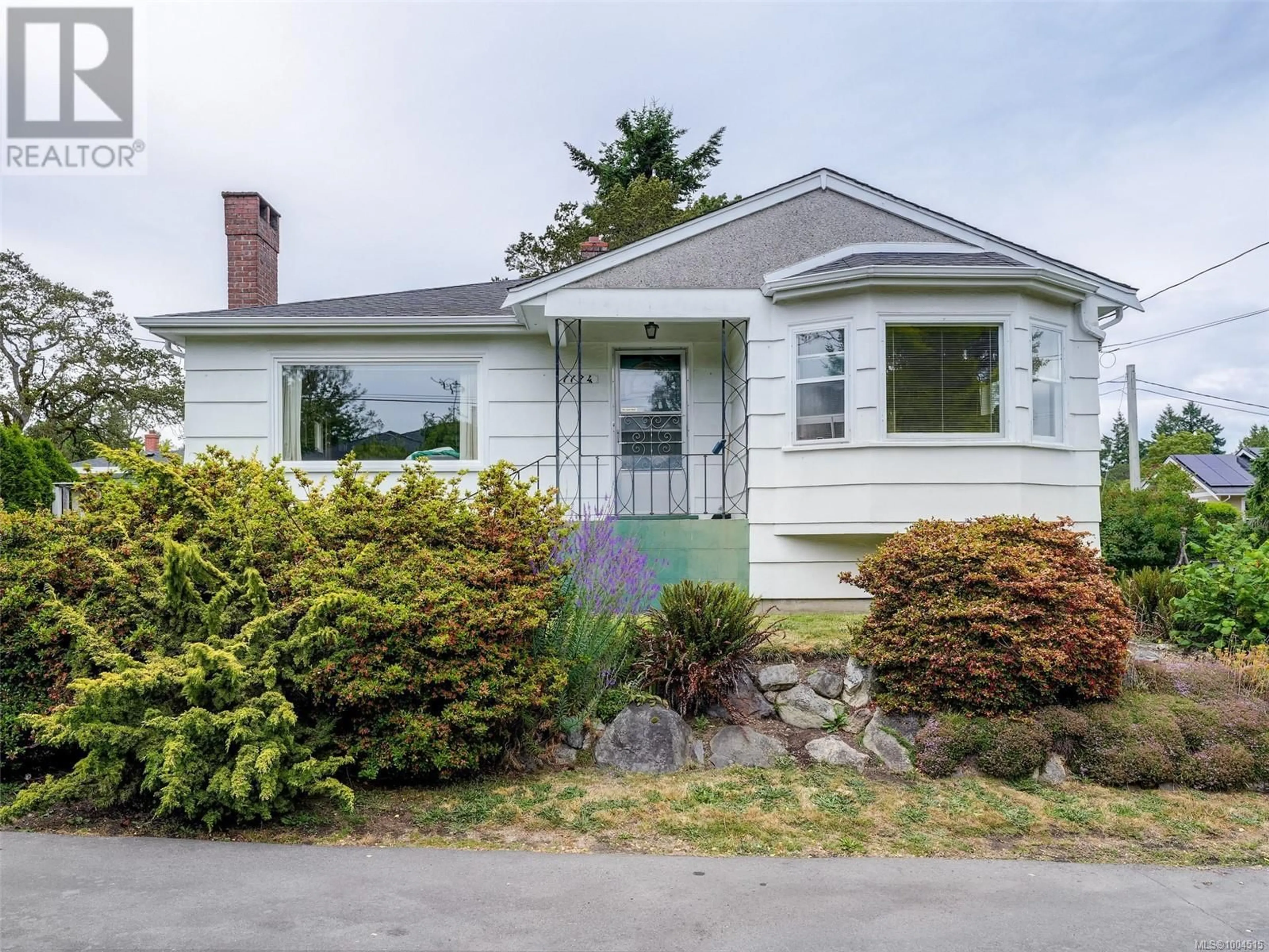 Home with vinyl exterior material, street for 1174 SCHRAM DRIVE, Saanich British Columbia V8P2K2