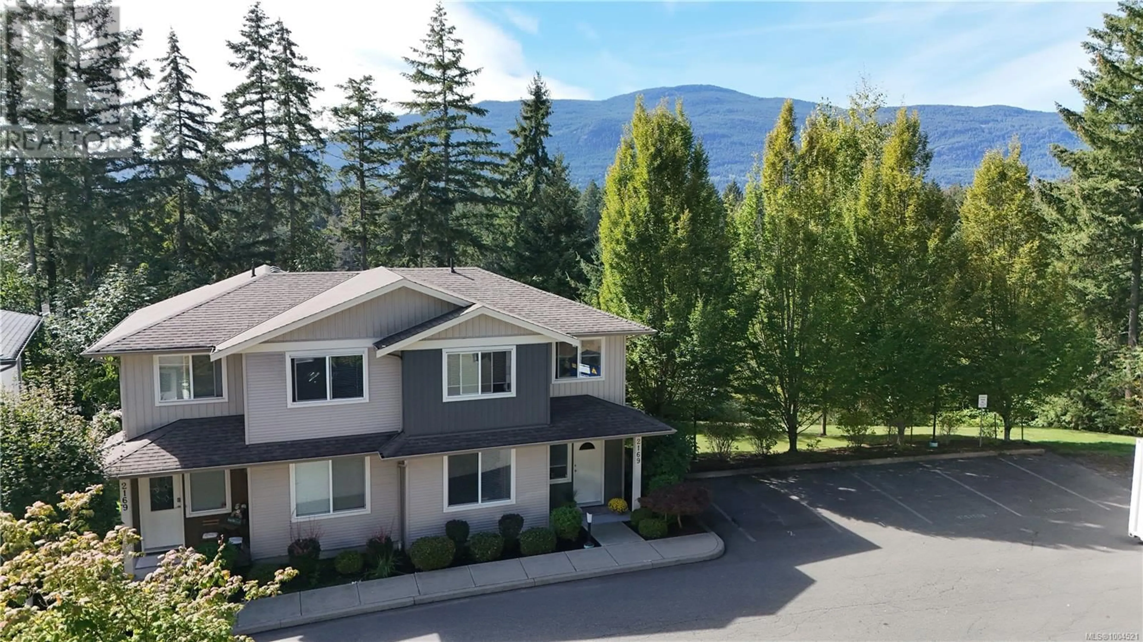 A pic from outside/outdoor area/front of a property/back of a property/a pic from drone, mountain view for 101 - 2169 RIDGEMONT PLACE, Nanaimo British Columbia V9T0C8