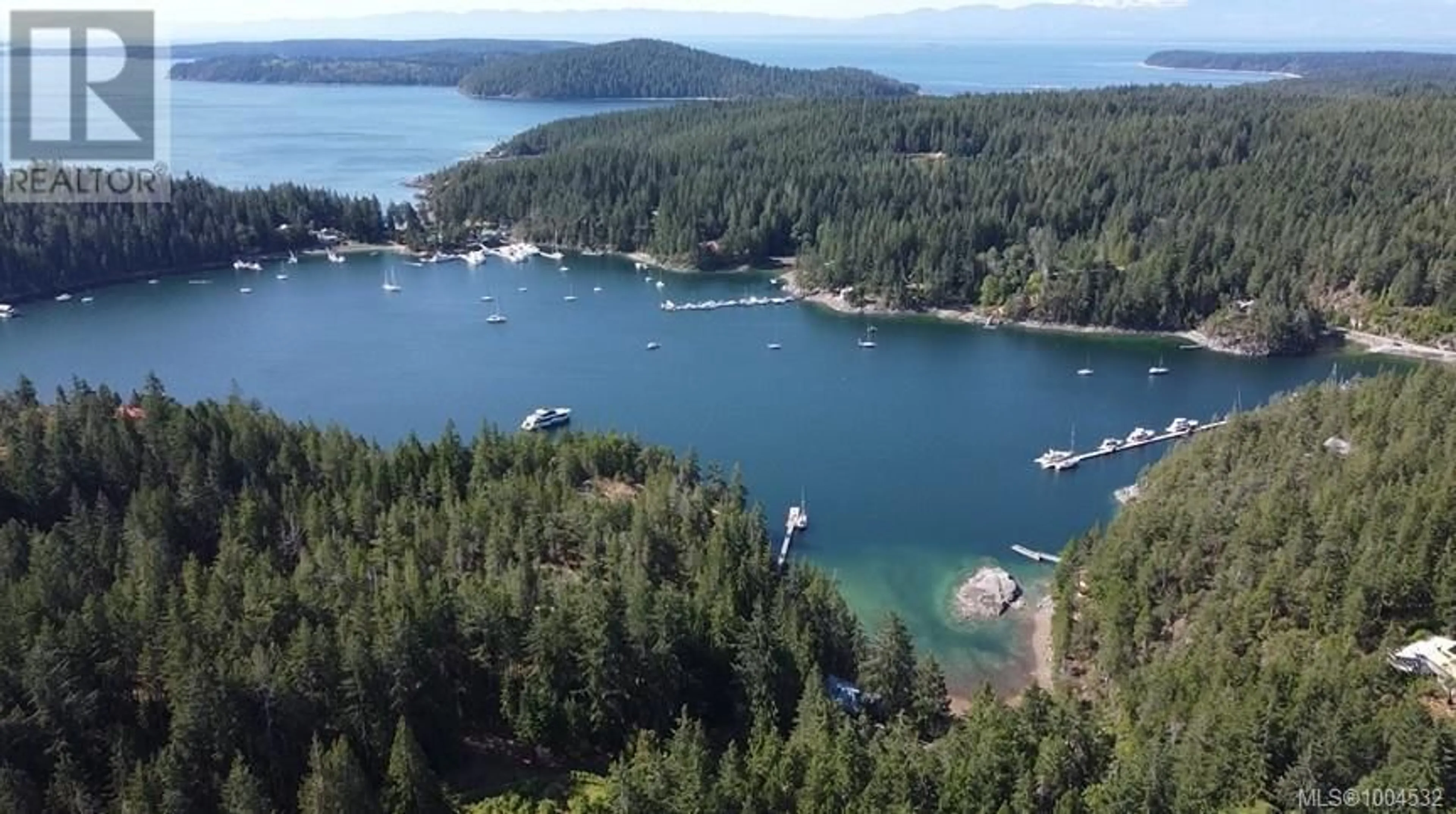 A pic from outside/outdoor area/front of a property/back of a property/a pic from drone, water/lake/river/ocean view for 1416 MANZANITA ROAD, Cortes Island British Columbia V0P1T0