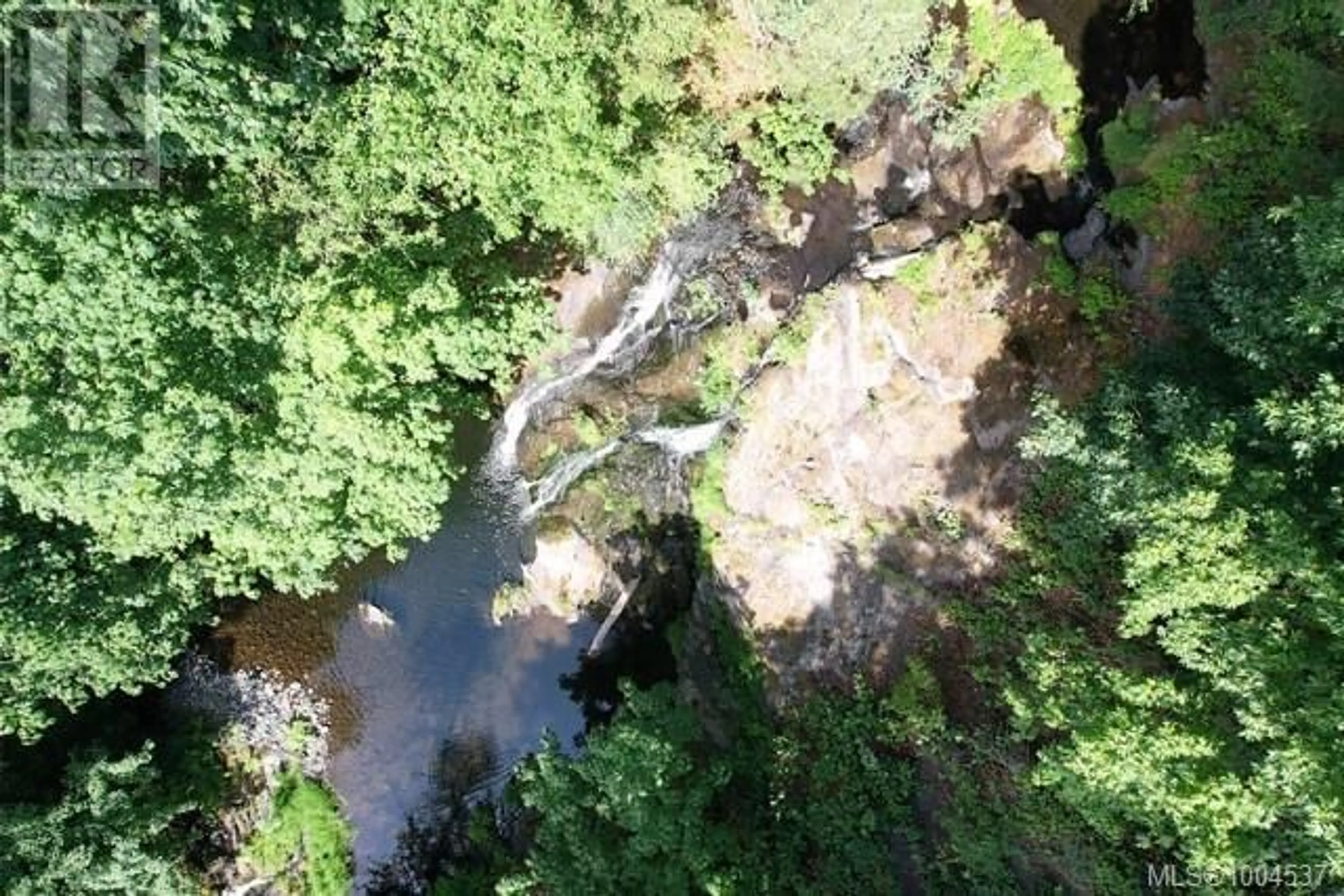 A pic from outside/outdoor area/front of a property/back of a property/a pic from drone, forest/trees view for 3744 GIBBINS ROAD, Duncan British Columbia V9L6E8