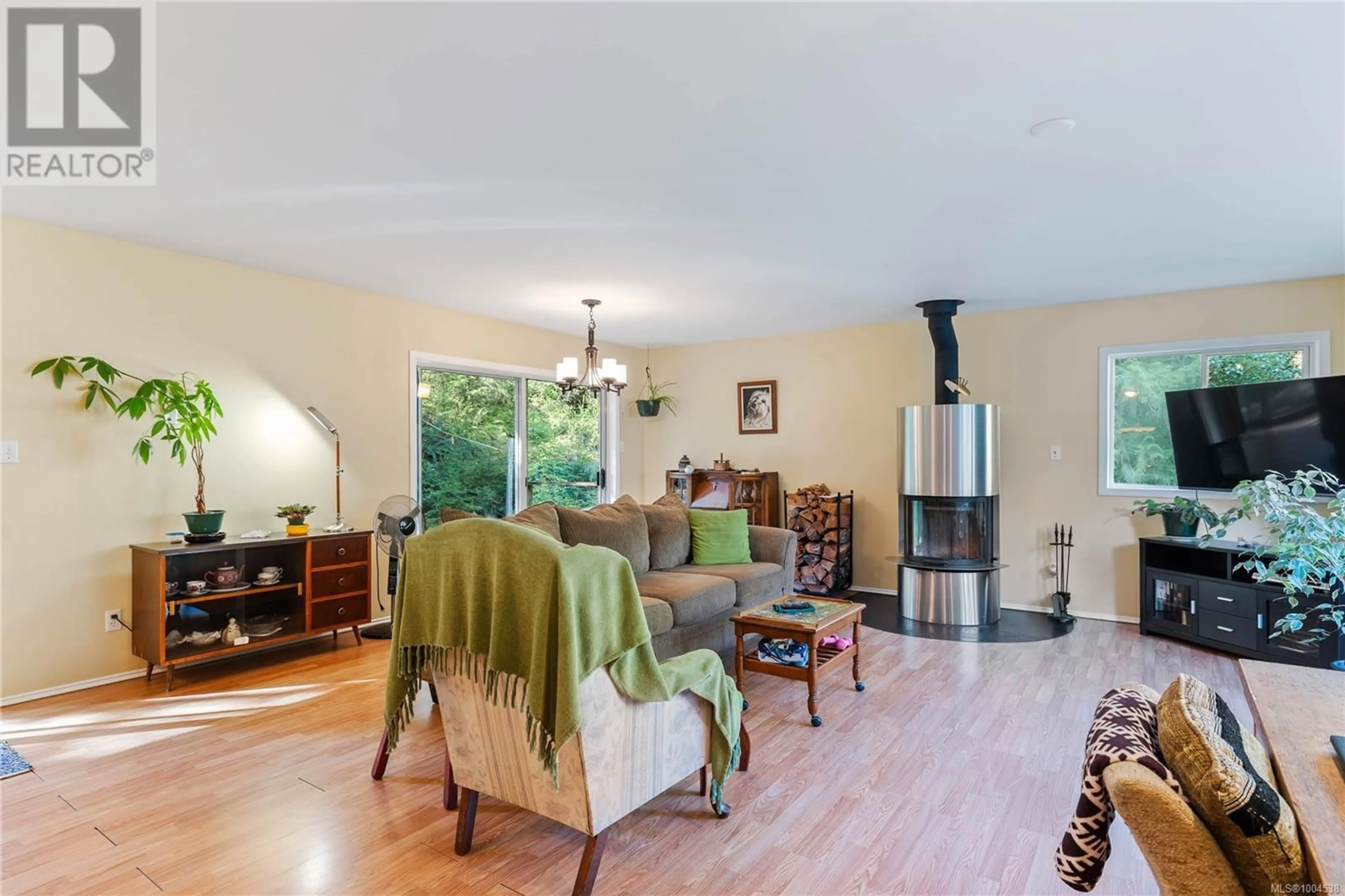Living room with furniture, wood/laminate floor for 151 LE PAGE ROAD, Salt Spring British Columbia V8K1N1