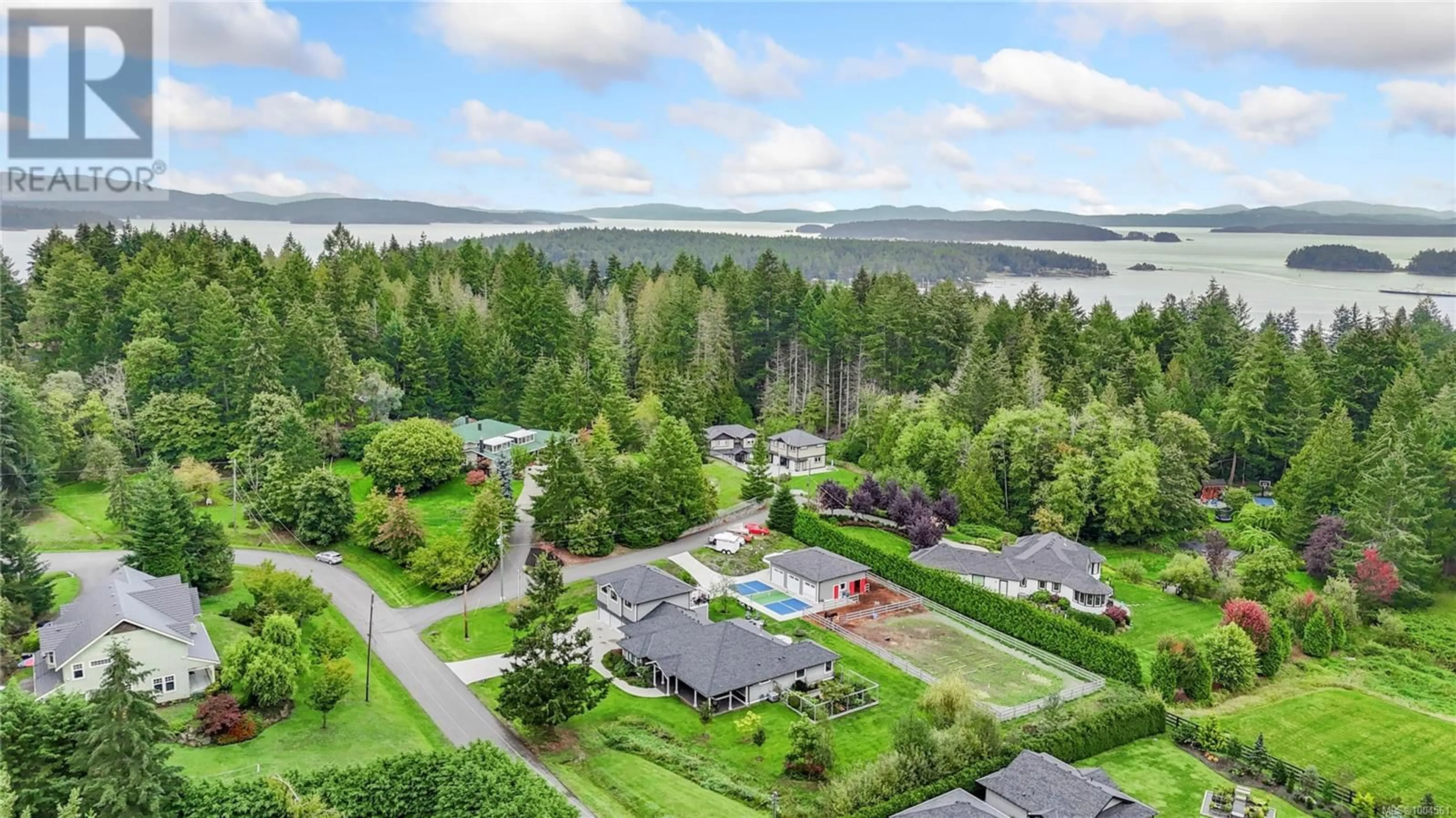 A pic from outside/outdoor area/front of a property/back of a property/a pic from drone, water/lake/river/ocean view for 11329 HUMMINGBIRD PLACE, North Saanich British Columbia V8L5S3