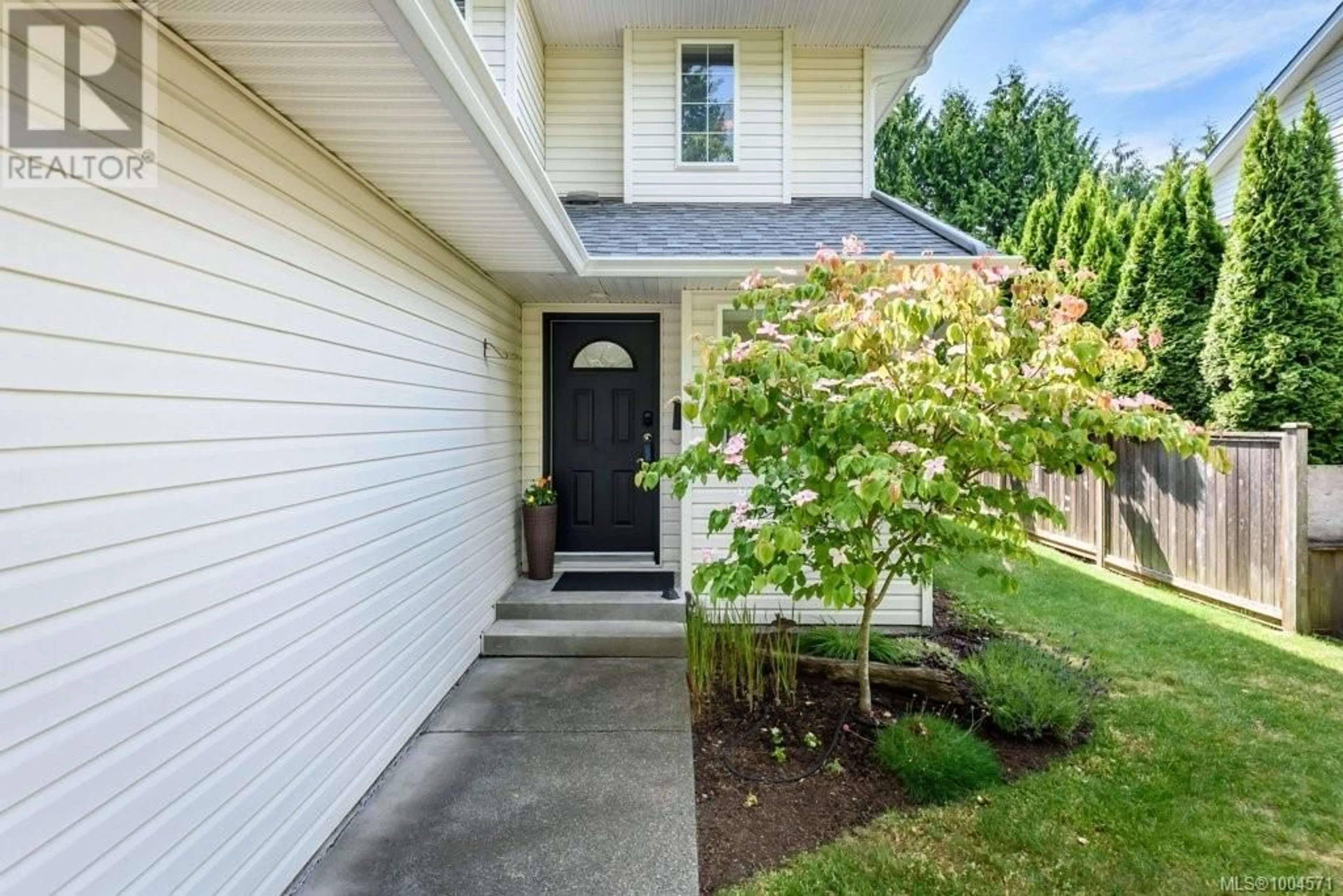 Home with vinyl exterior material, street for B - 2167 MISSION ROAD, Courtenay British Columbia V9N8Y7