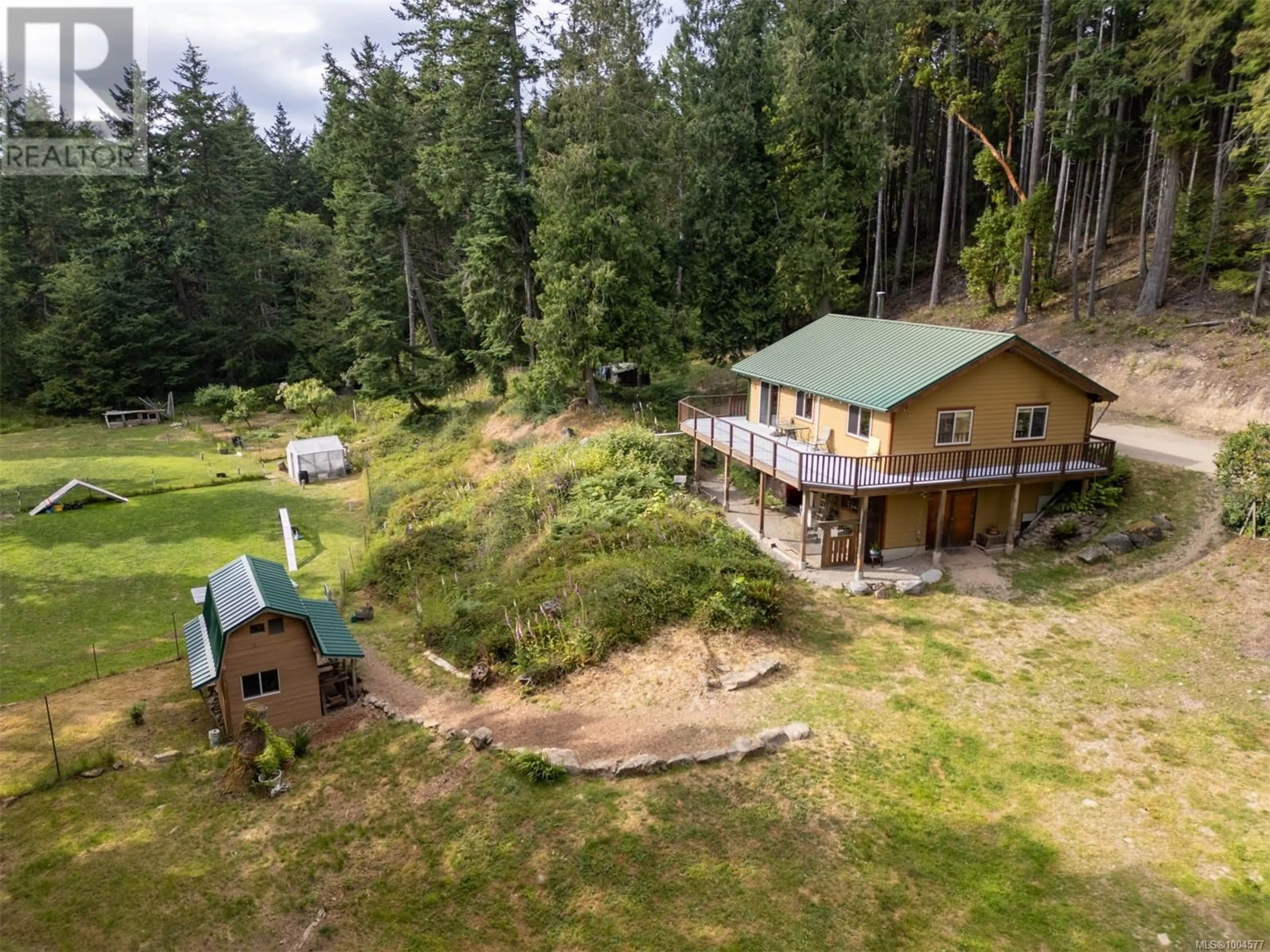 A pic from outside/outdoor area/front of a property/back of a property/a pic from drone, forest/trees view for 5574 HOOSON ROAD, Pender Island British Columbia V0N2M1