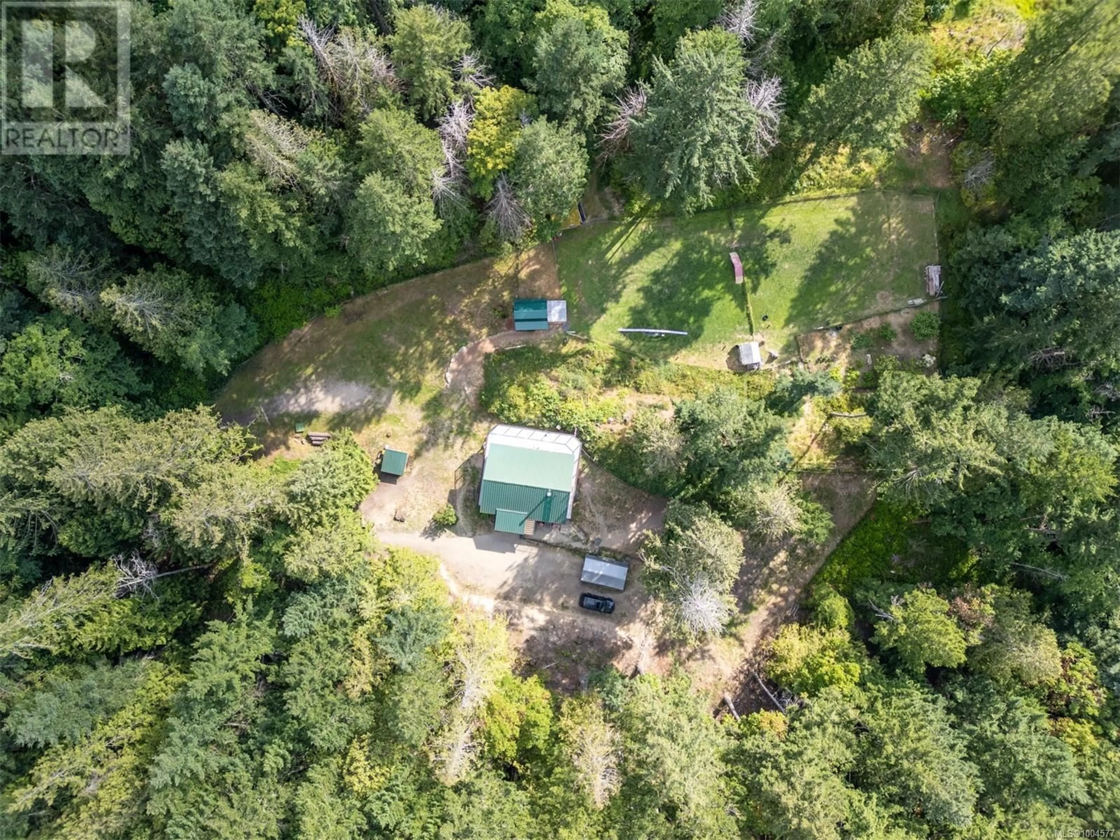 A pic from outside/outdoor area/front of a property/back of a property/a pic from drone, forest/trees view for 5574 HOOSON ROAD, Pender Island British Columbia V0N2M1