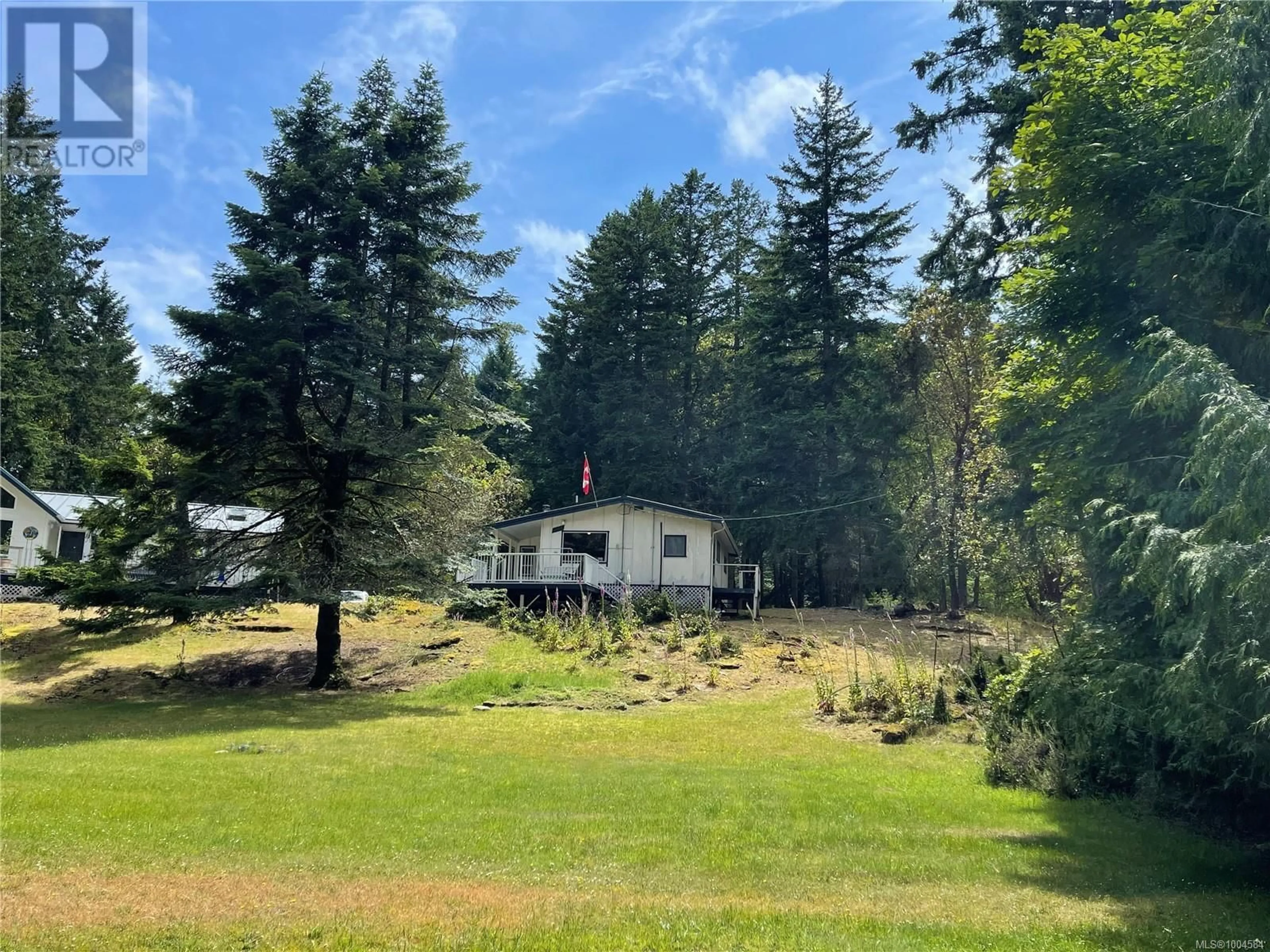 A pic from outside/outdoor area/front of a property/back of a property/a pic from drone, forest/trees view for 865 DRIFTWOOD DRIVE, Mudge Island British Columbia V1V1V1