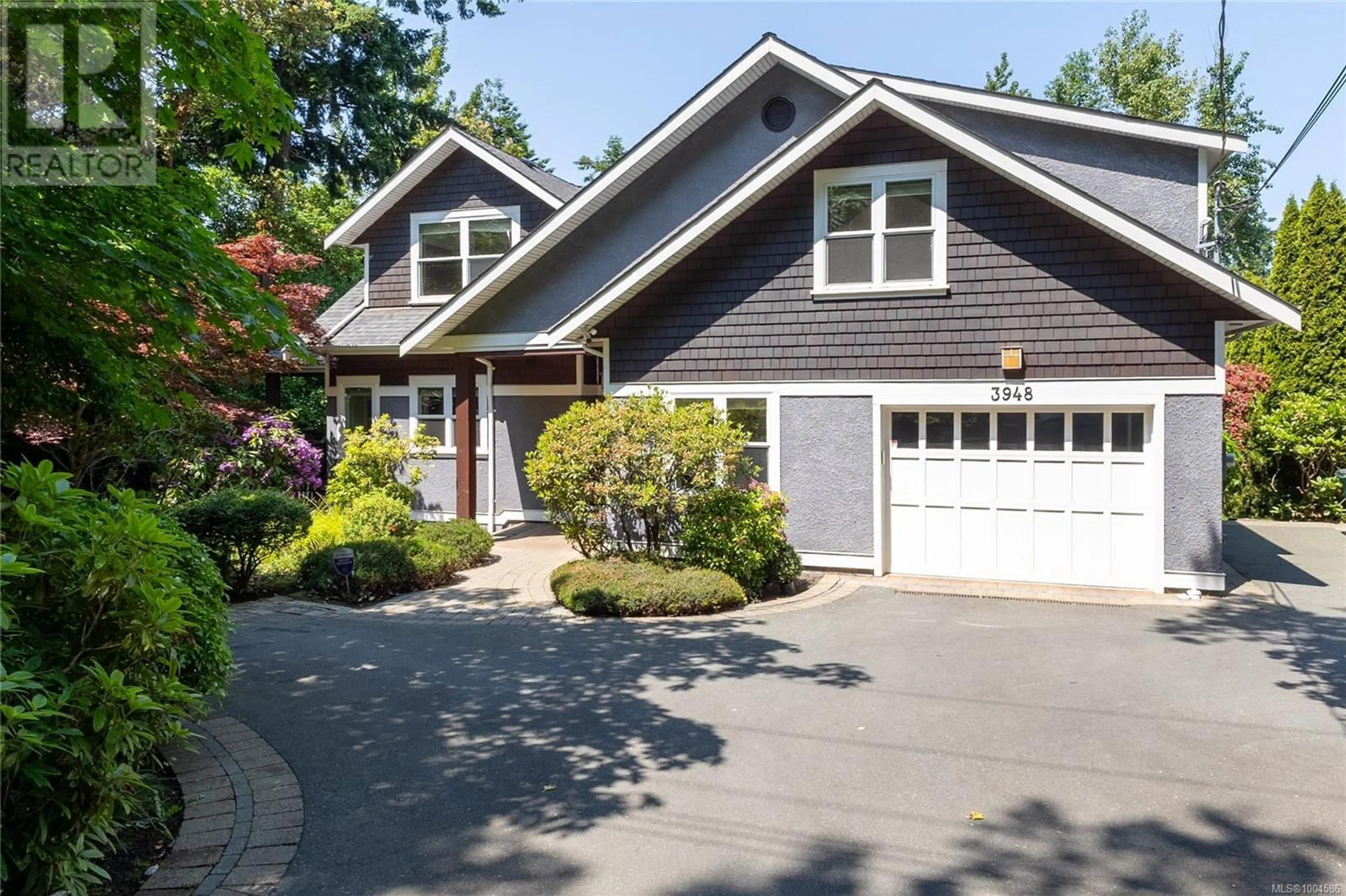 Home with vinyl exterior material, street for 3948 TELEGRAPH BAY ROAD, Saanich British Columbia V8N4H7