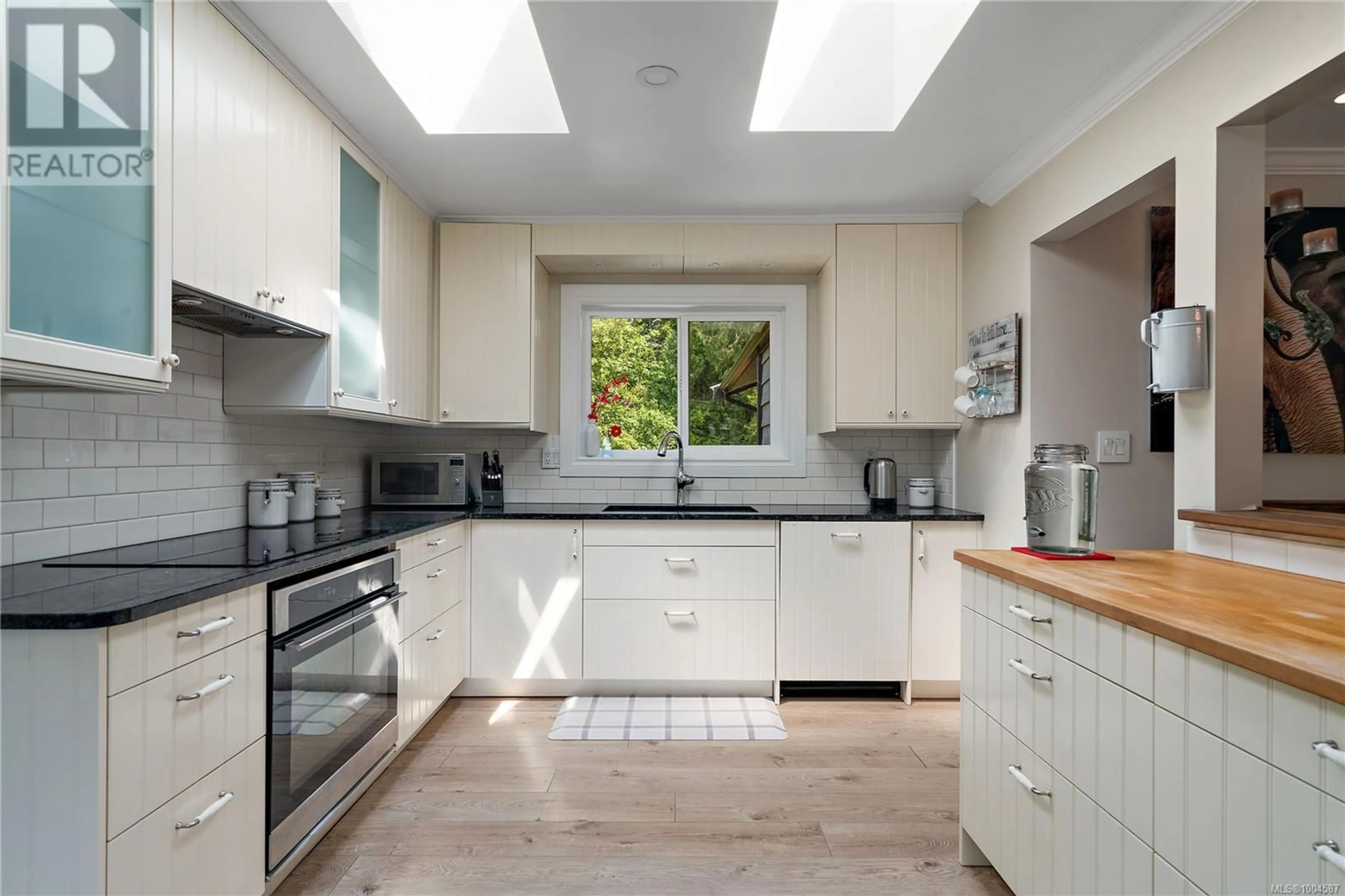 Contemporary kitchen, ceramic/tile floor for 870 WOODCREEK DRIVE, North Saanich British Columbia V8L4R4
