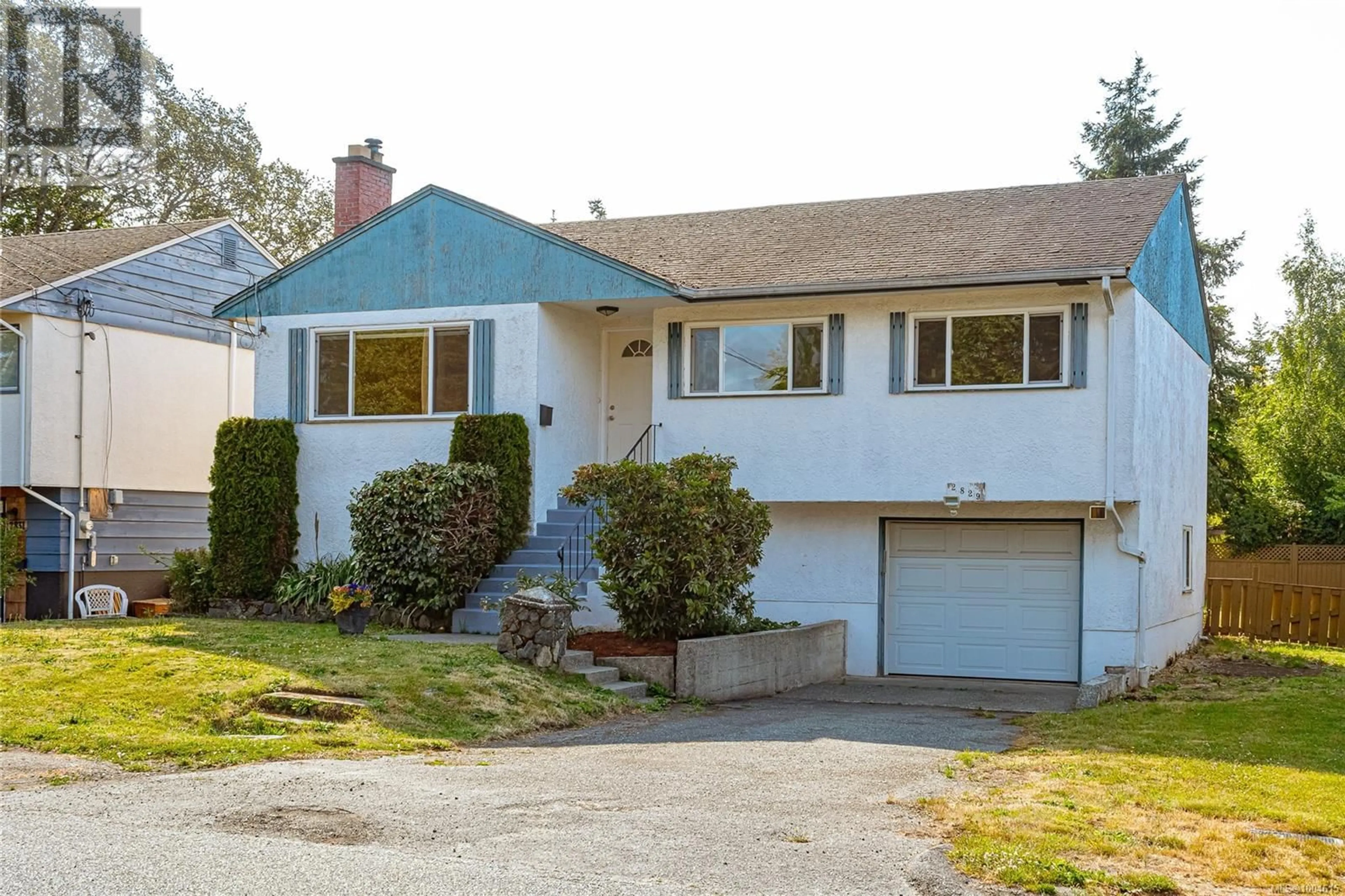 Home with vinyl exterior material, street for 2829 ADELAIDE AVENUE, Saanich British Columbia V9A2L3