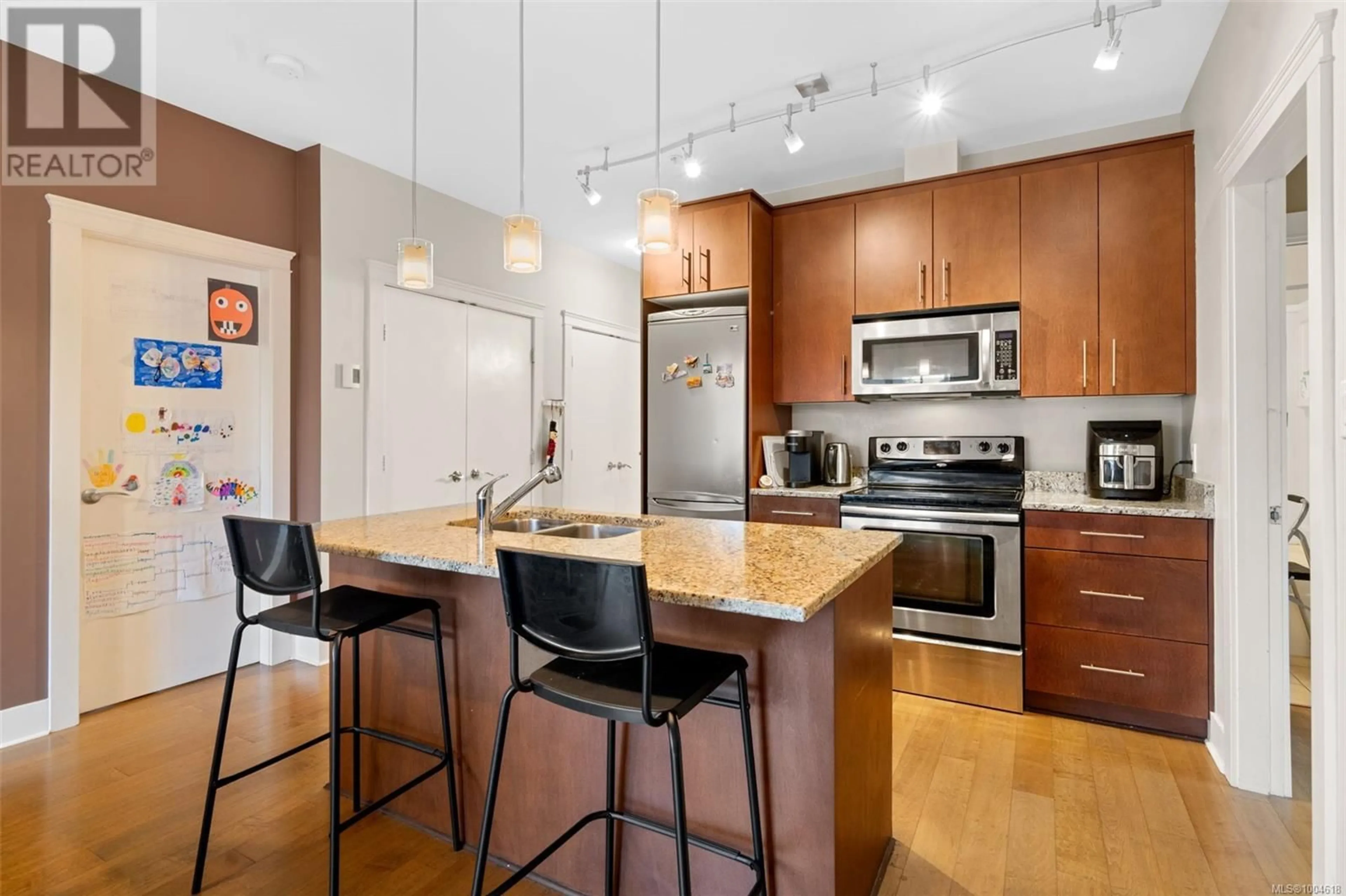 Open concept kitchen, wood/laminate floor for 201 - 21 CONARD STREET, View Royal British Columbia V8Z5G1