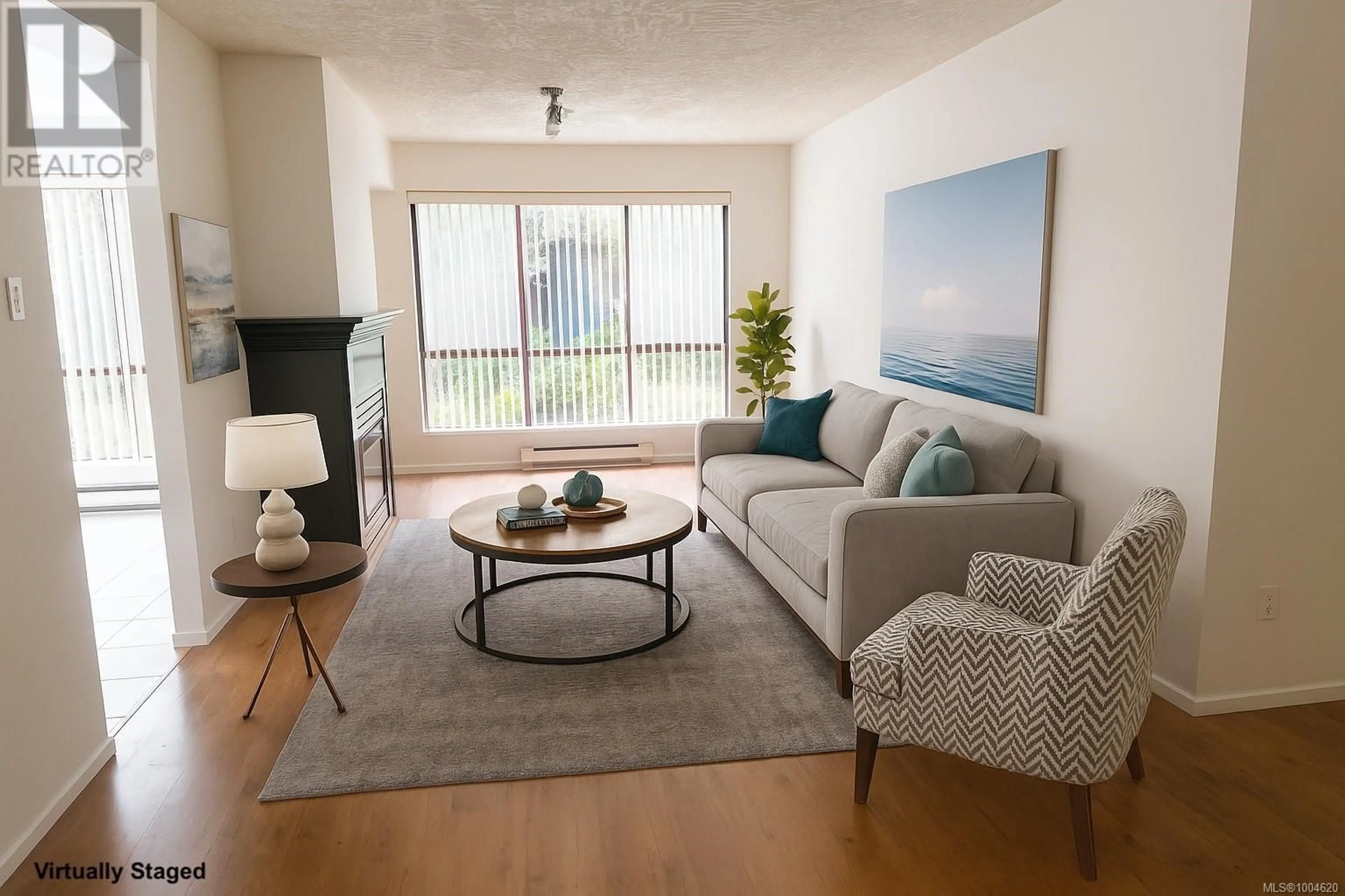 Living room with furniture, wood/laminate floor for 201 - 520 DUNEDIN STREET, Victoria British Columbia V8T2L6