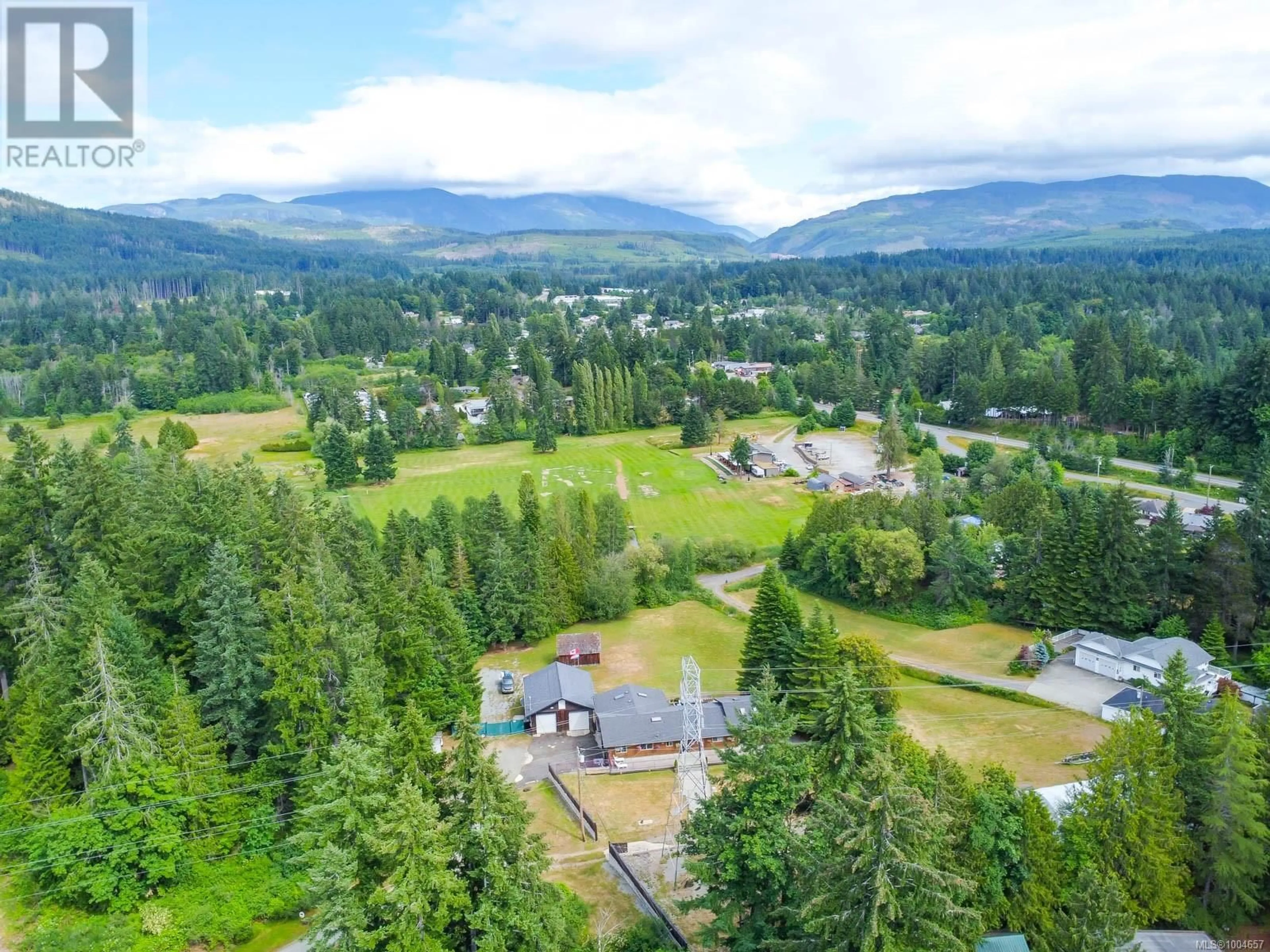 A pic from outside/outdoor area/front of a property/back of a property/a pic from drone, mountain view for 5090 ARDEN ROAD, Port Alberni British Columbia V9Y8R5