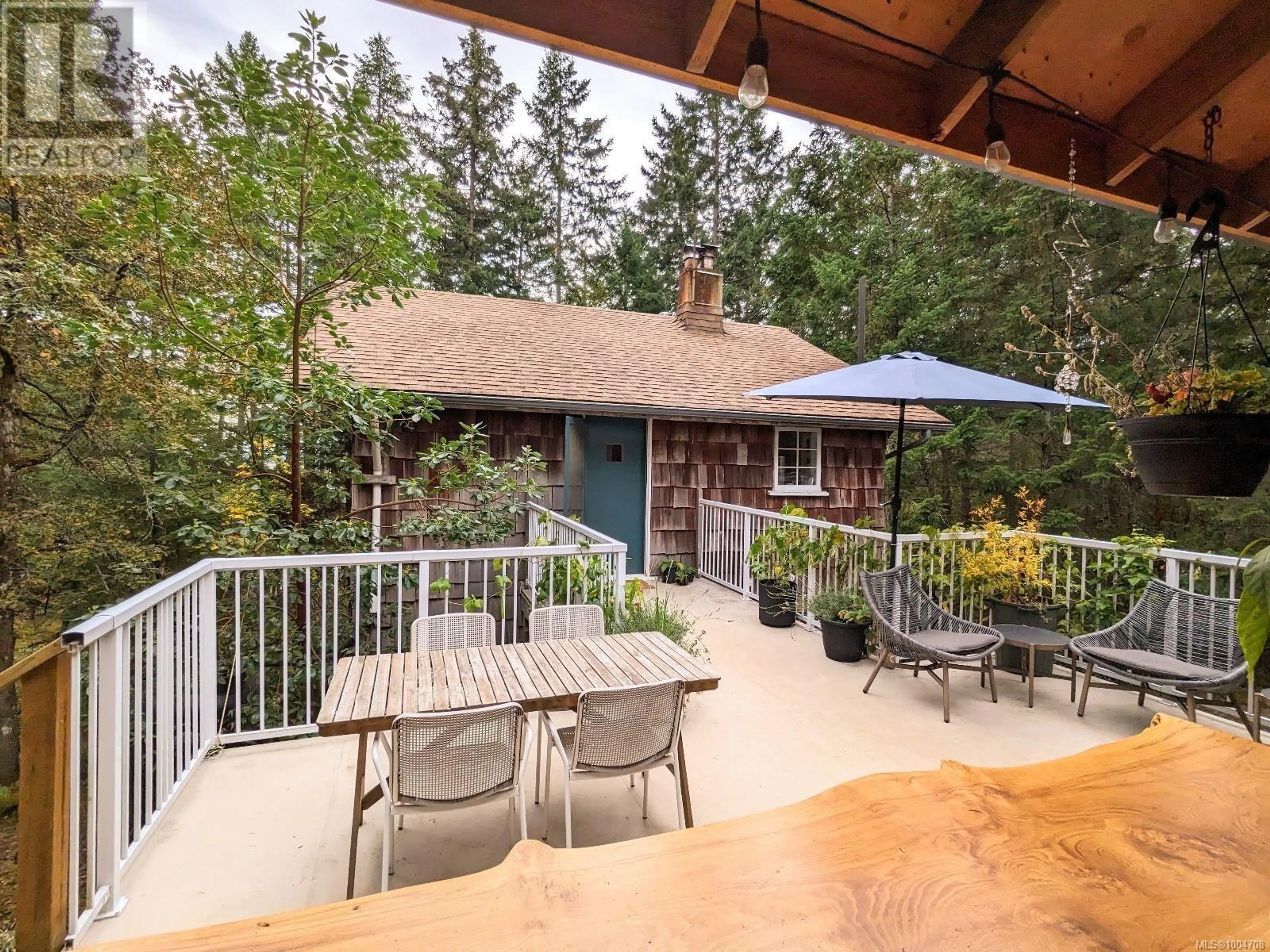 Patio, forest/trees view for 415 HALIBUT HILL ROAD, Mudge Island British Columbia V0R1X0