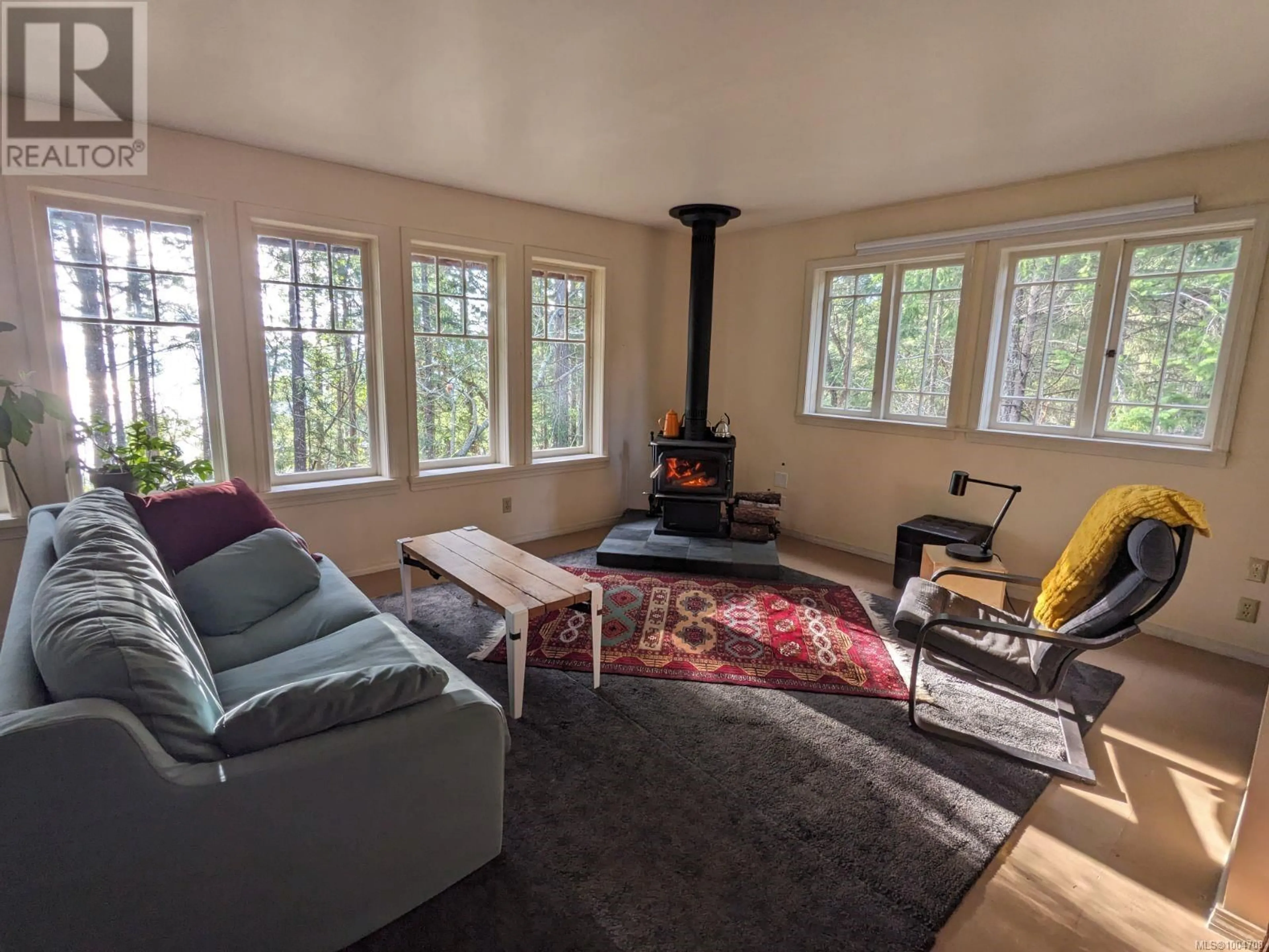 Living room with furniture, unknown for 415 HALIBUT HILL ROAD, Mudge Island British Columbia V0R1X0