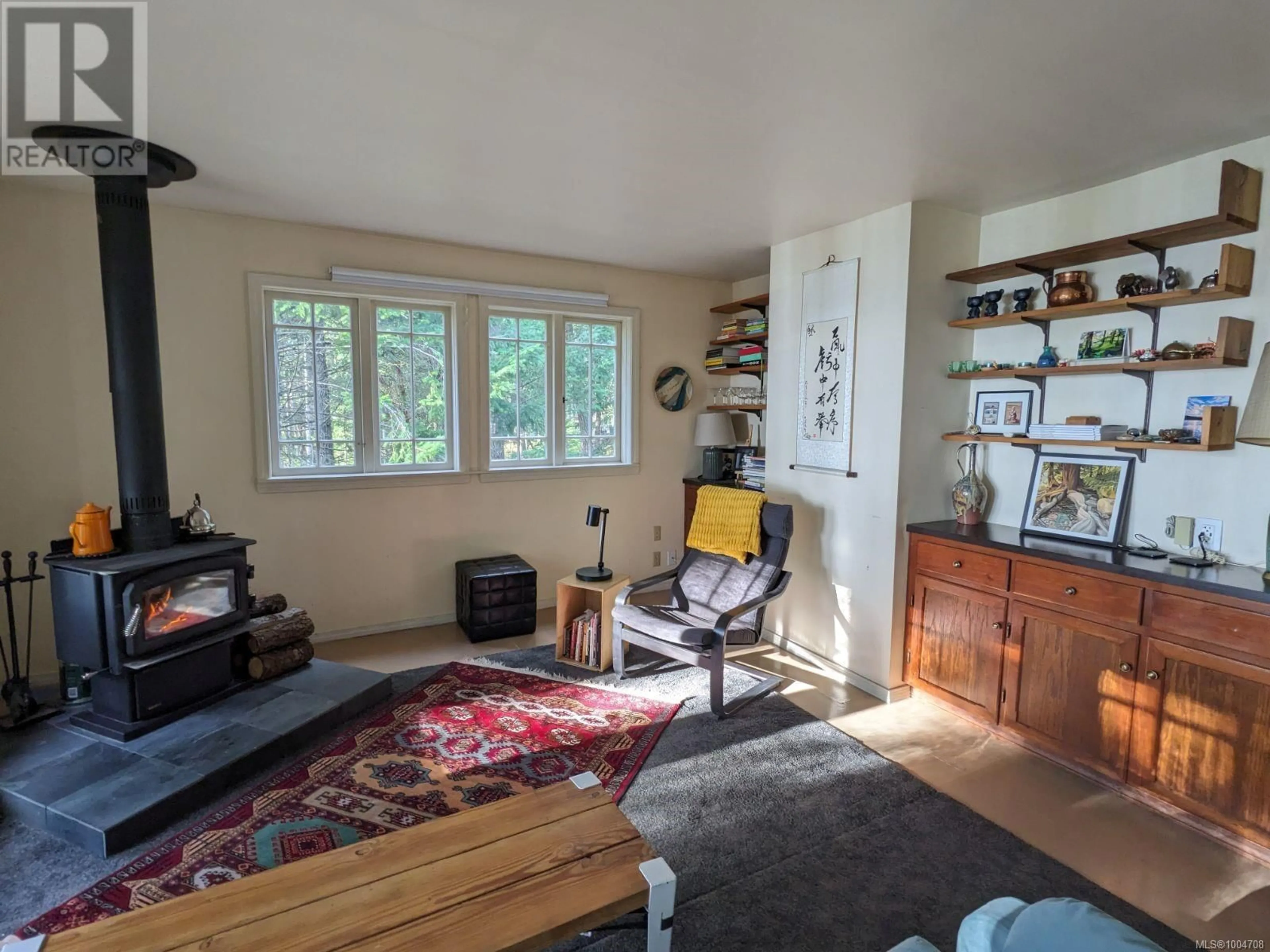 Living room with furniture, unknown for 415 HALIBUT HILL ROAD, Mudge Island British Columbia V0R1X0