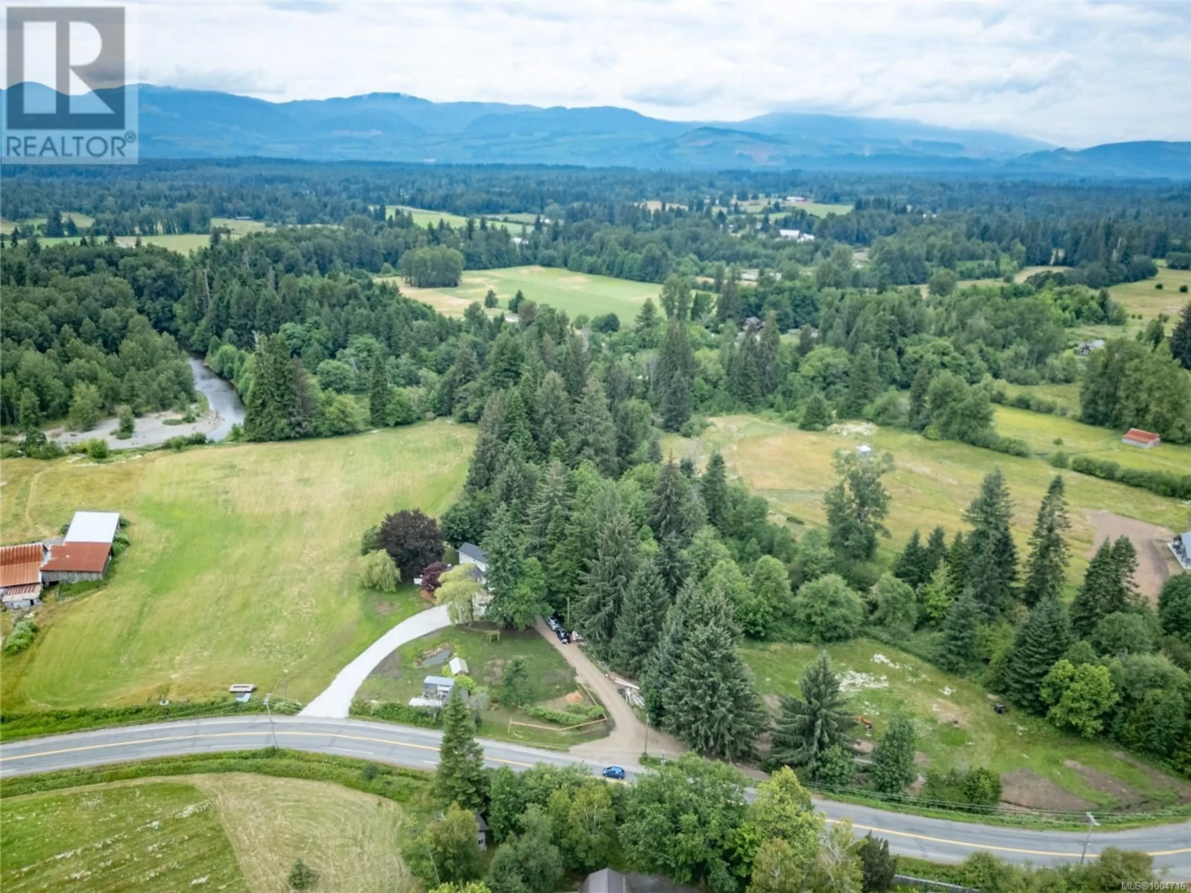A pic from outside/outdoor area/front of a property/back of a property/a pic from drone, mountain view for 5077 HEADQUARTERS ROAD, Courtenay British Columbia V9J1P1