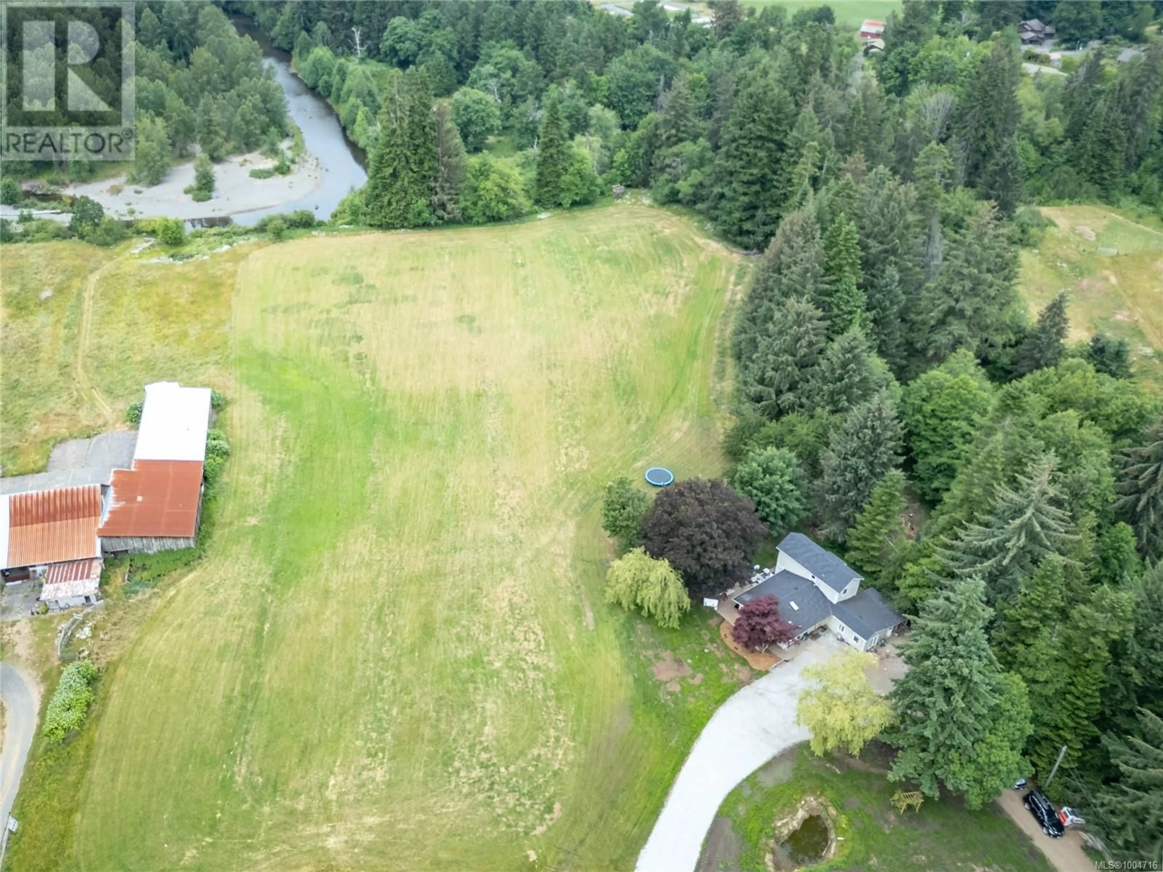 A pic from outside/outdoor area/front of a property/back of a property/a pic from drone, forest/trees view for 5077 HEADQUARTERS ROAD, Courtenay British Columbia V9J1P1