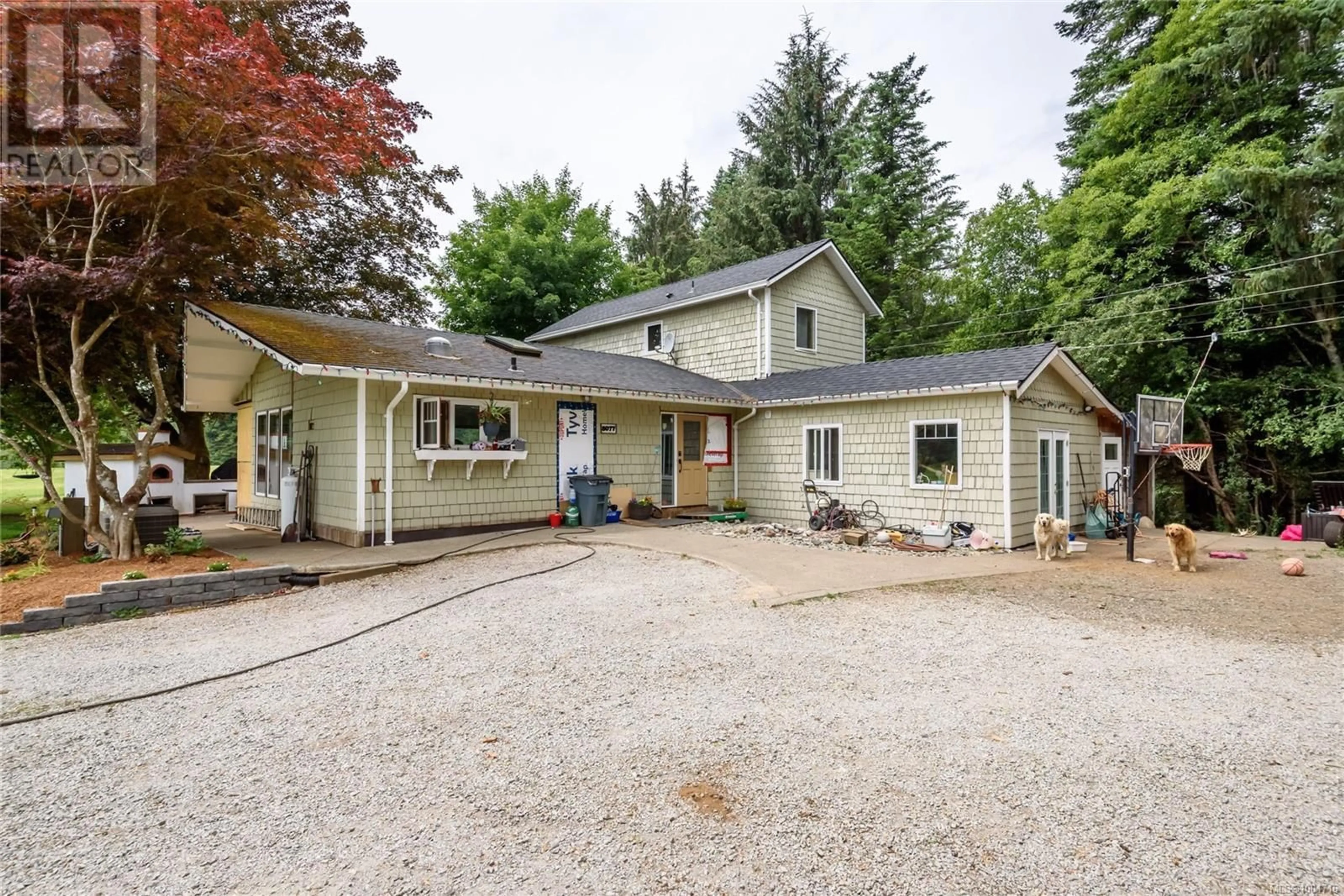 A pic from outside/outdoor area/front of a property/back of a property/a pic from drone, street for 5077 HEADQUARTERS ROAD, Courtenay British Columbia V9J1P1