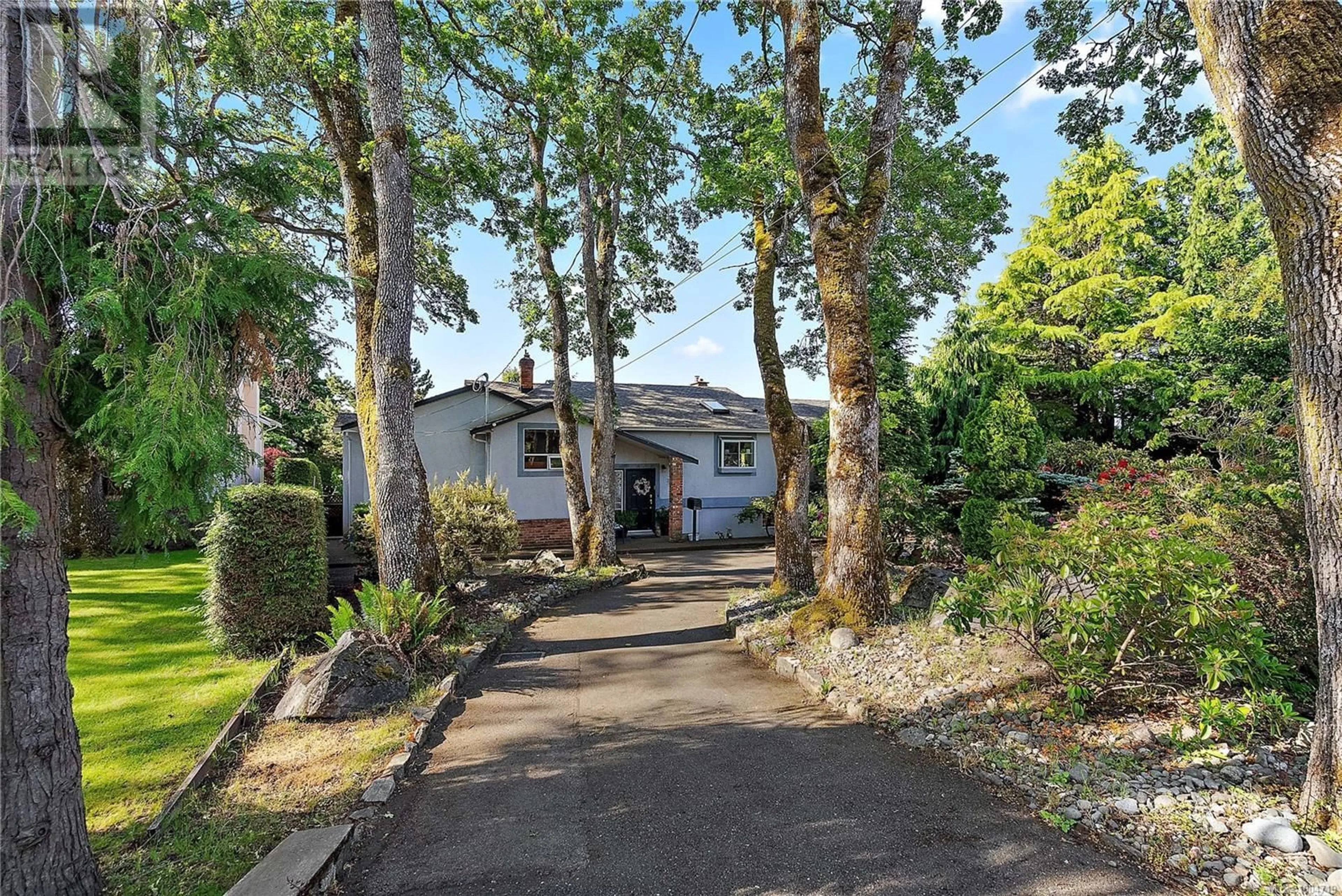 A pic from outside/outdoor area/front of a property/back of a property/a pic from drone, street for 1529 MT. DOUGLAS CROSS ROAD, Saanich British Columbia V8N1Z9