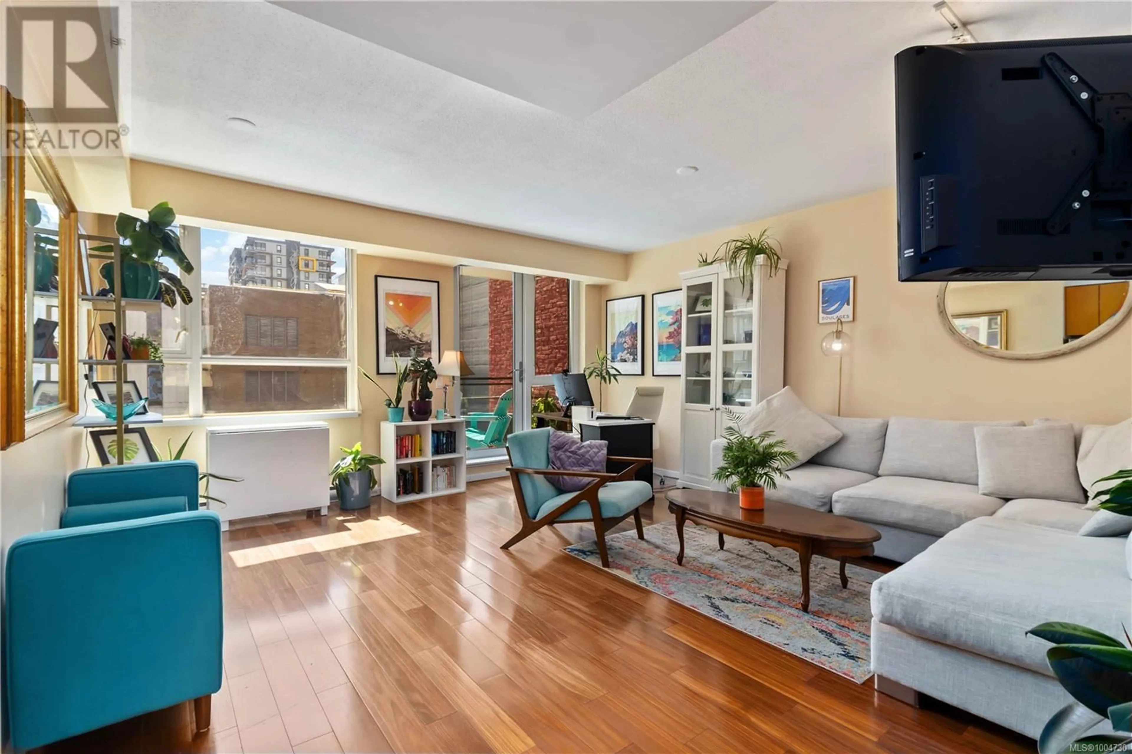 Living room with furniture, unknown for 406 - 834 JOHNSON STREET, Victoria British Columbia V8W1N3