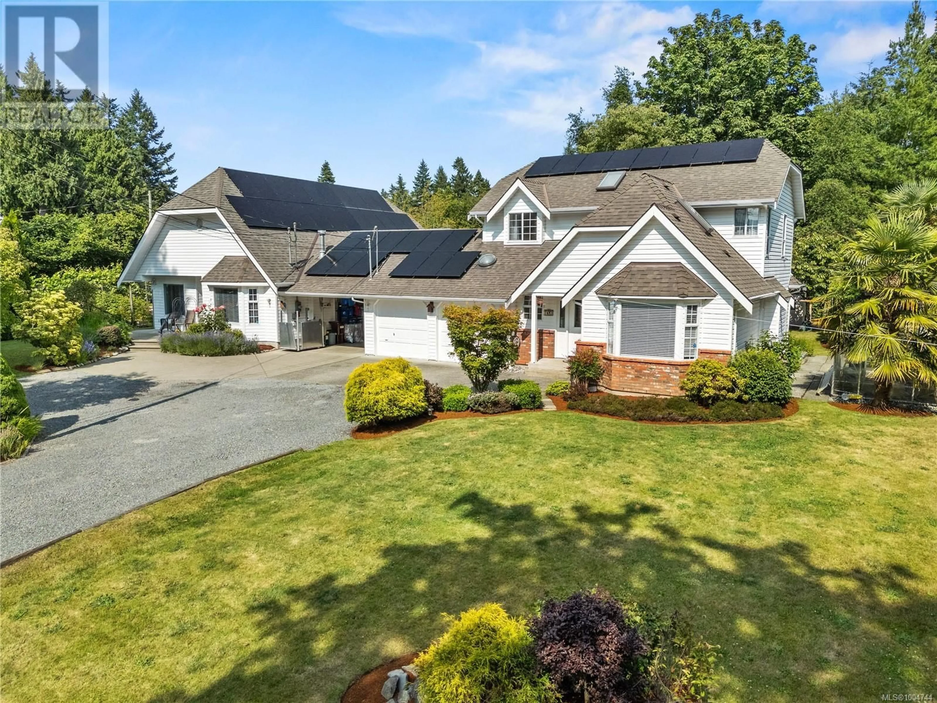 Home with vinyl exterior material, street for 7483 TOMLINSON ROAD, Central Saanich British Columbia V8M1S7