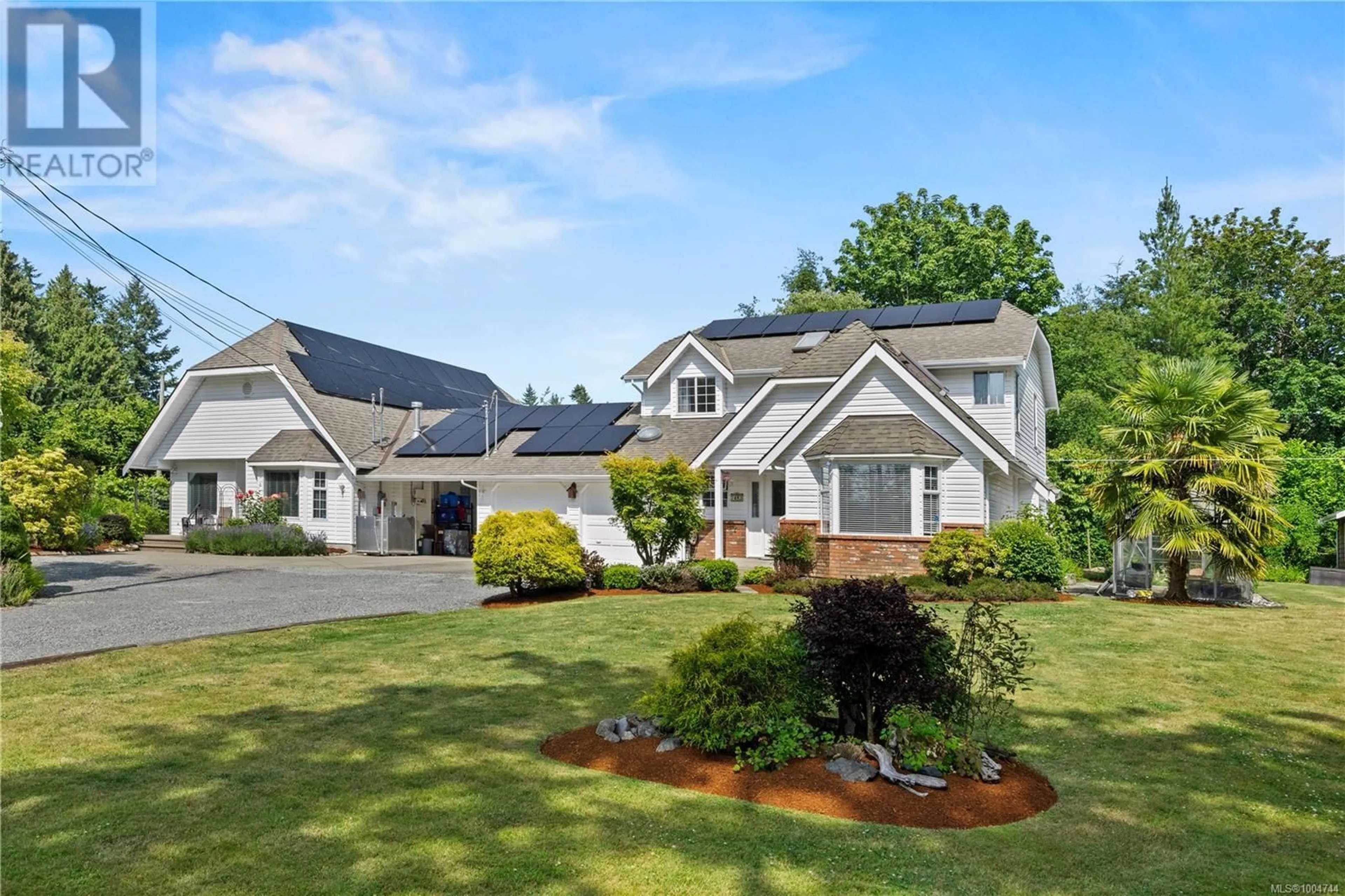 Home with vinyl exterior material, mountain view for 7483 TOMLINSON ROAD, Central Saanich British Columbia V8M1S7