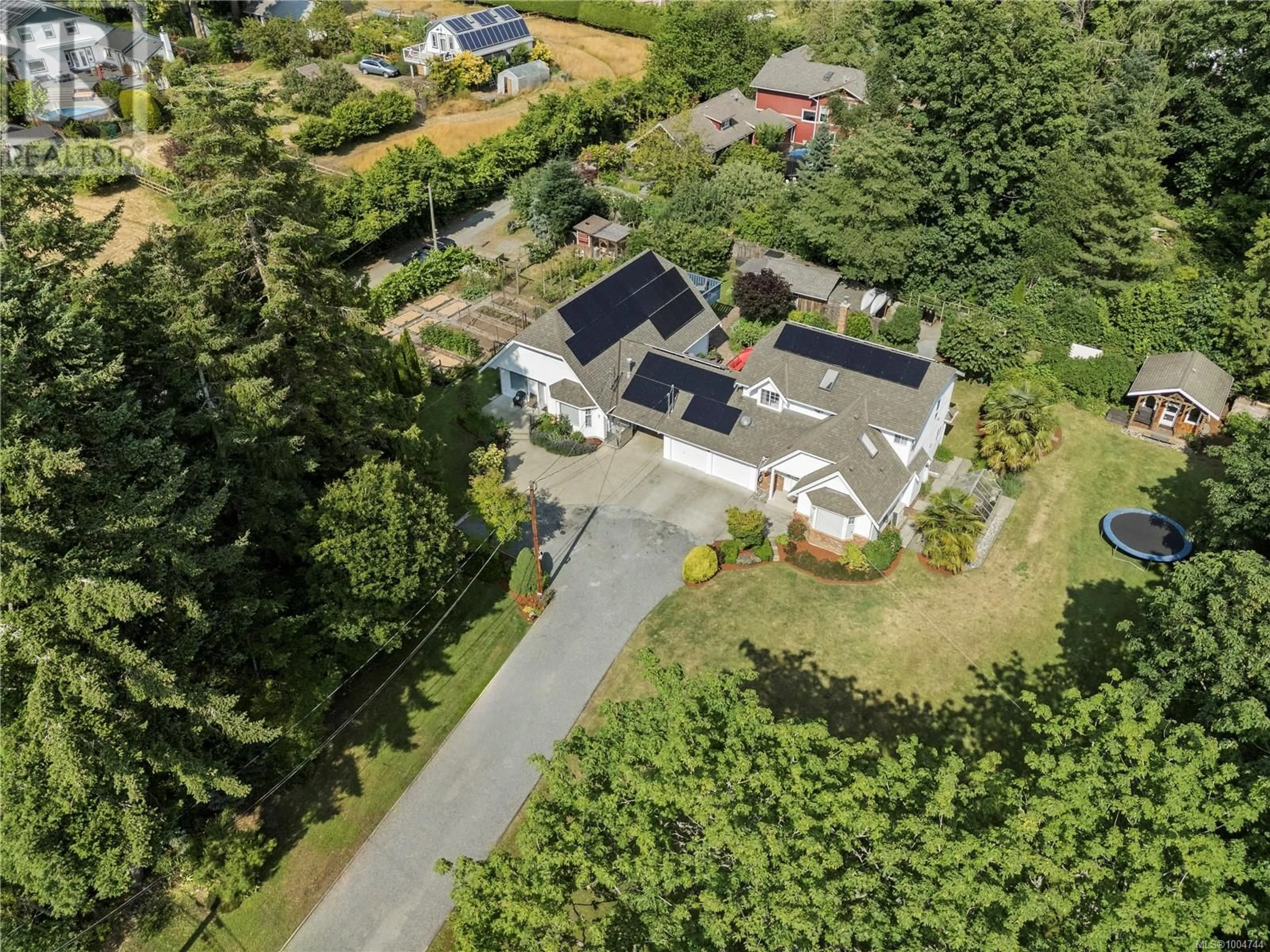 A pic from outside/outdoor area/front of a property/back of a property/a pic from drone, street for 7483 TOMLINSON ROAD, Central Saanich British Columbia V8M1S7