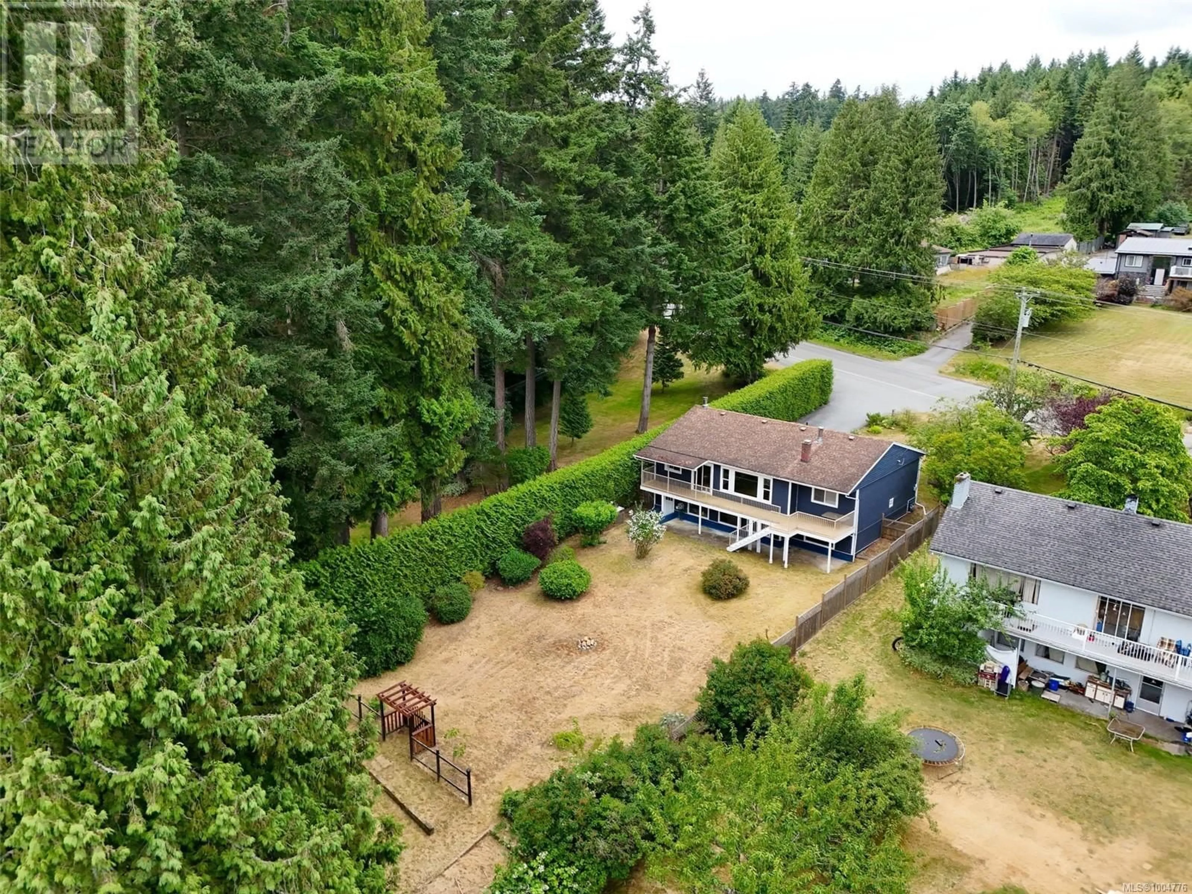 A pic from outside/outdoor area/front of a property/back of a property/a pic from drone, forest/trees view for 6982 DICKINSON ROAD, Lantzville British Columbia V0R2H0