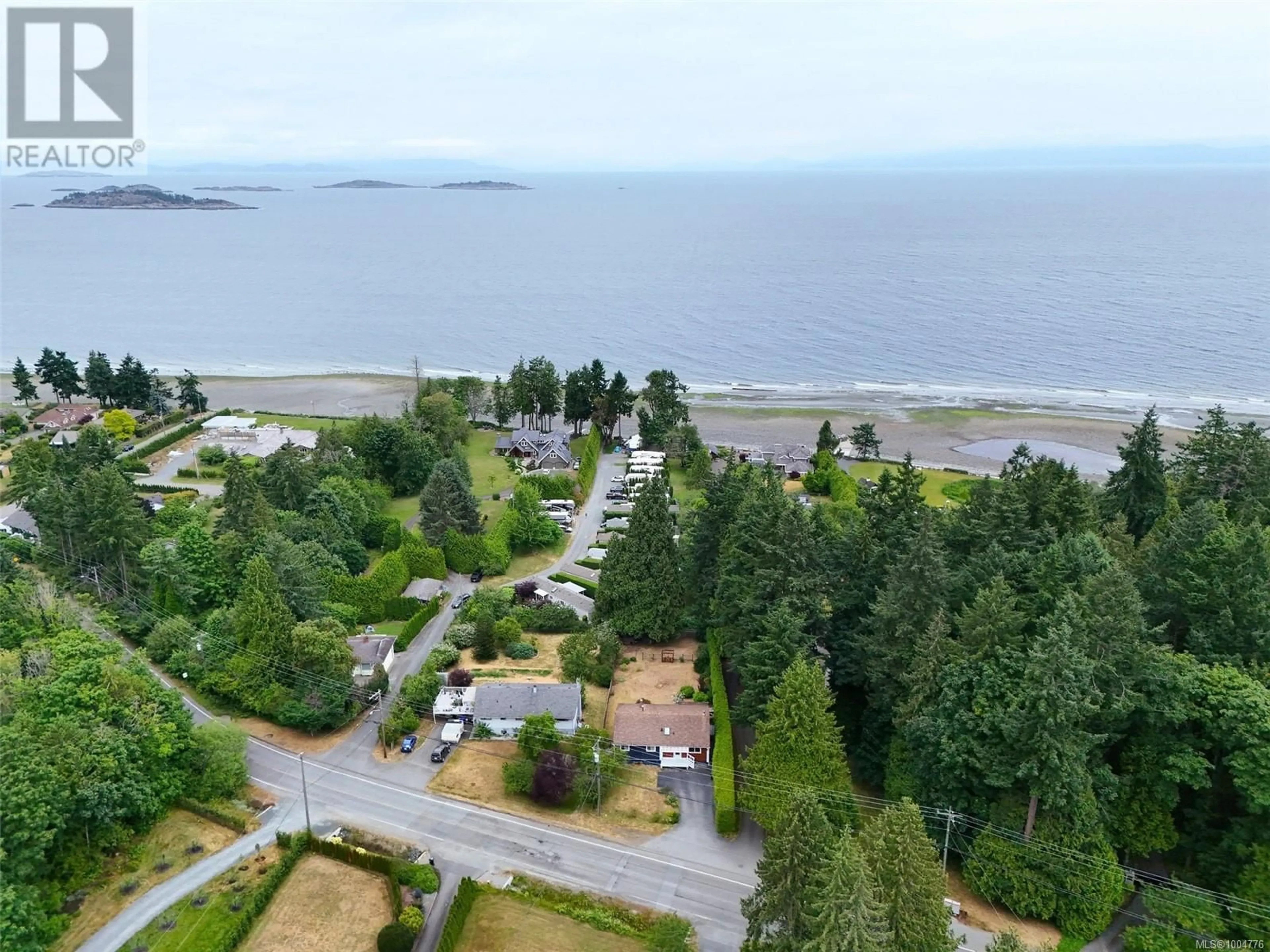A pic from outside/outdoor area/front of a property/back of a property/a pic from drone, water/lake/river/ocean view for 6982 DICKINSON ROAD, Lantzville British Columbia V0R2H0