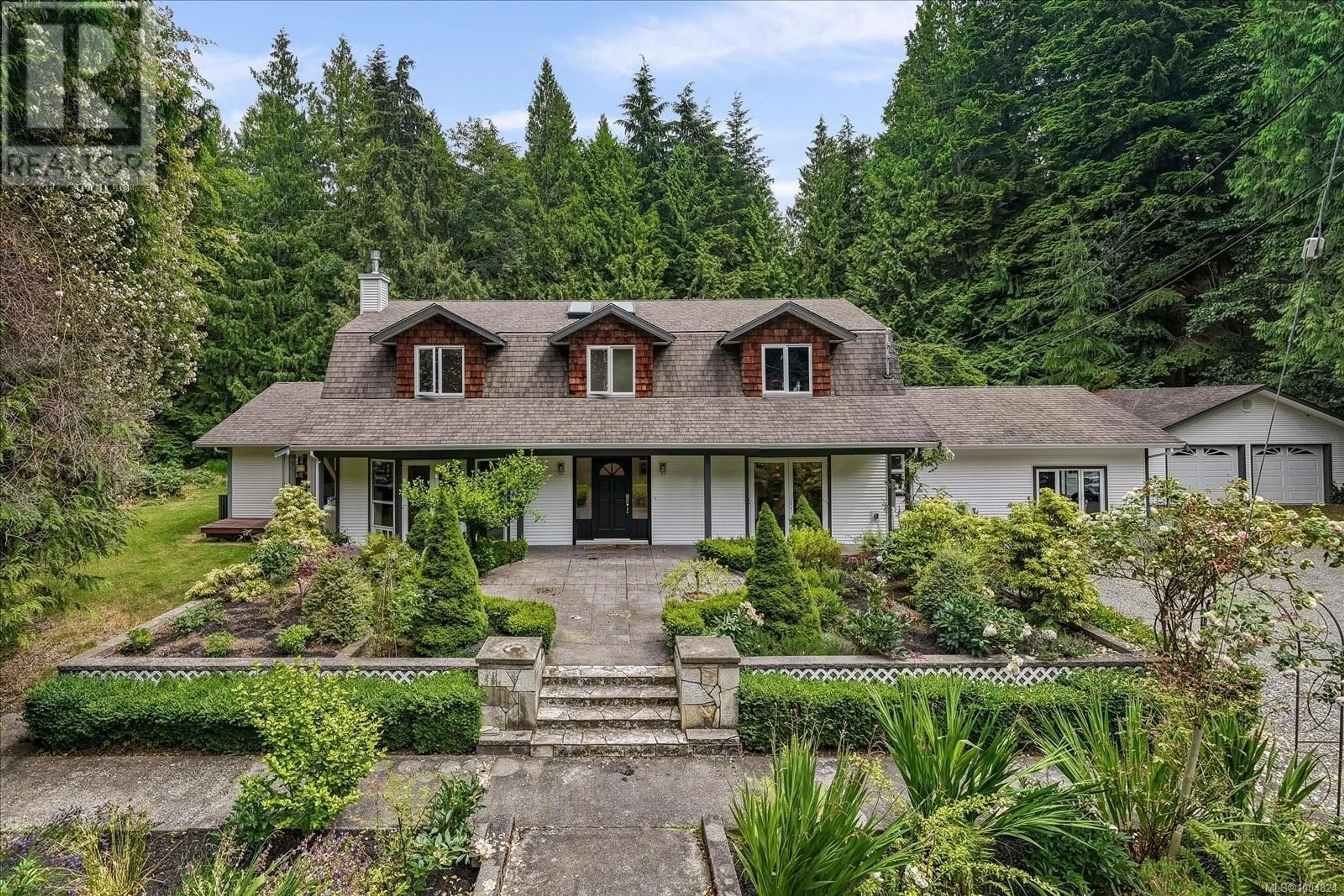 A pic from outside/outdoor area/front of a property/back of a property/a pic from drone, street for 6940 JACKS ROAD, Lantzville British Columbia V0R2H0