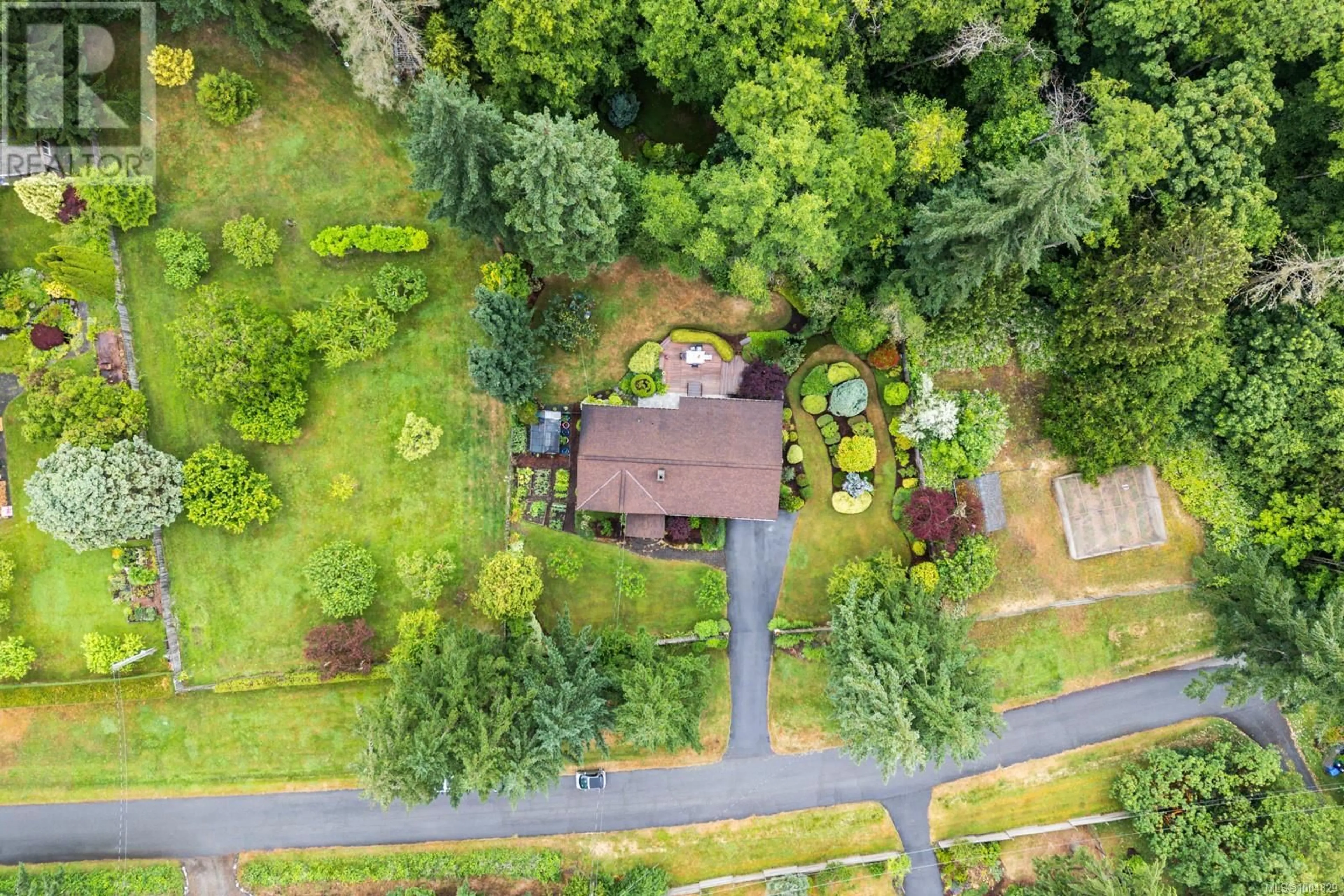A pic from outside/outdoor area/front of a property/back of a property/a pic from drone, forest/trees view for 471 GOULET ROAD, Mill Bay British Columbia V0R2P3