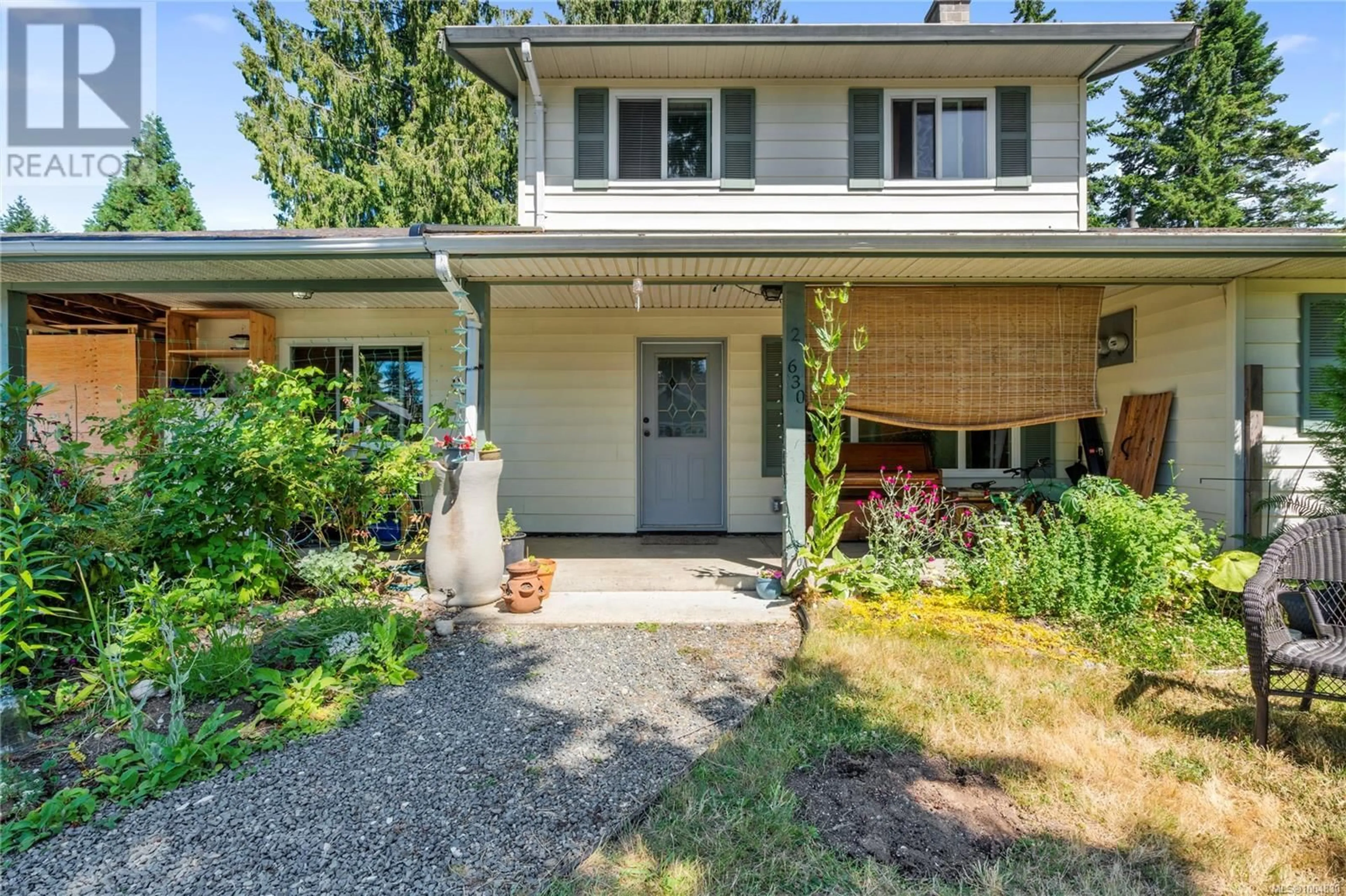 Home with vinyl exterior material, street for 2 - 630 MAPLE STREET, Qualicum Beach British Columbia V9K1J3