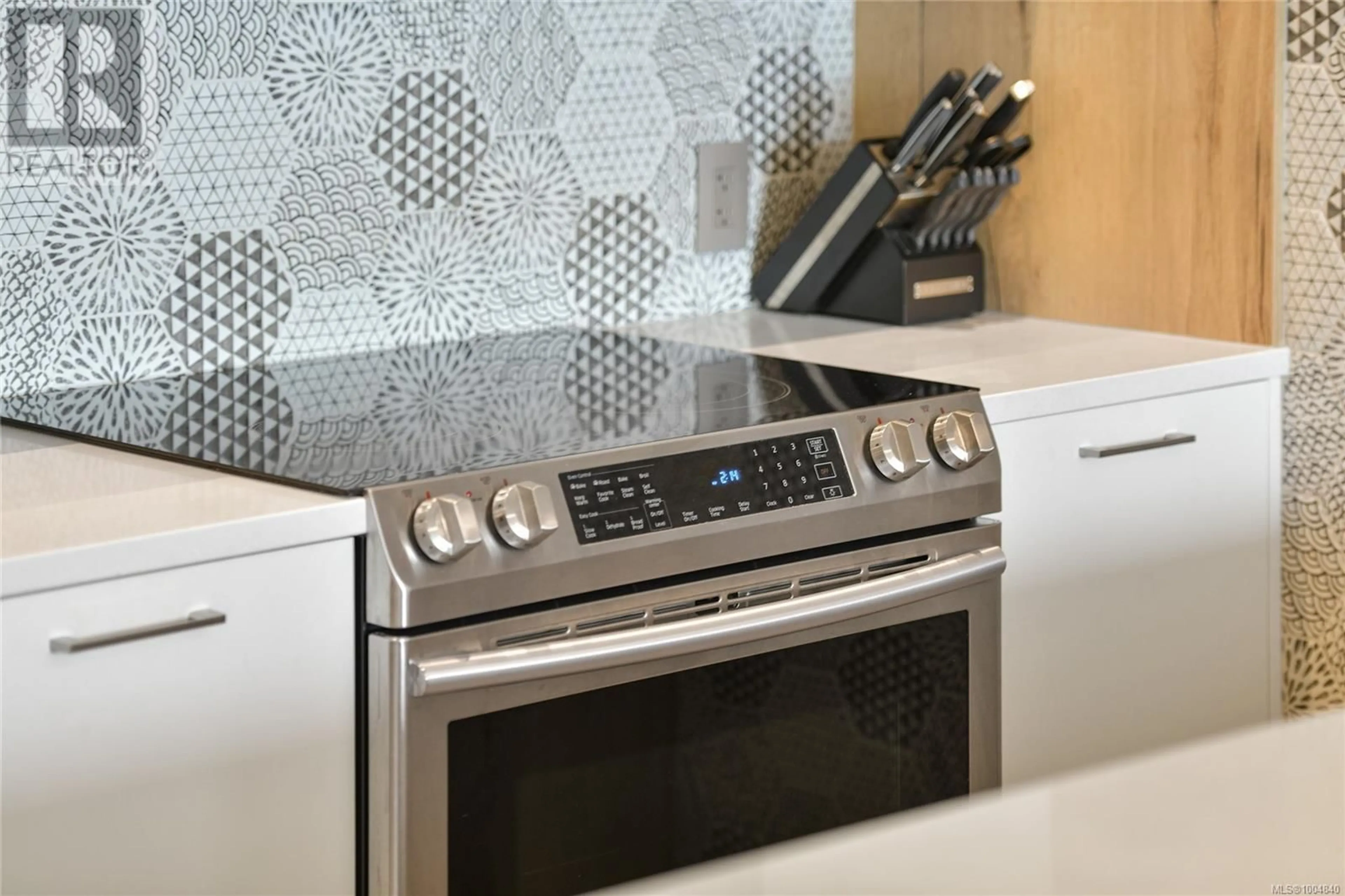 Contemporary kitchen, ceramic/tile floor for 306 - 1588 NORTH DAIRY ROAD, Saanich British Columbia V8T0E1