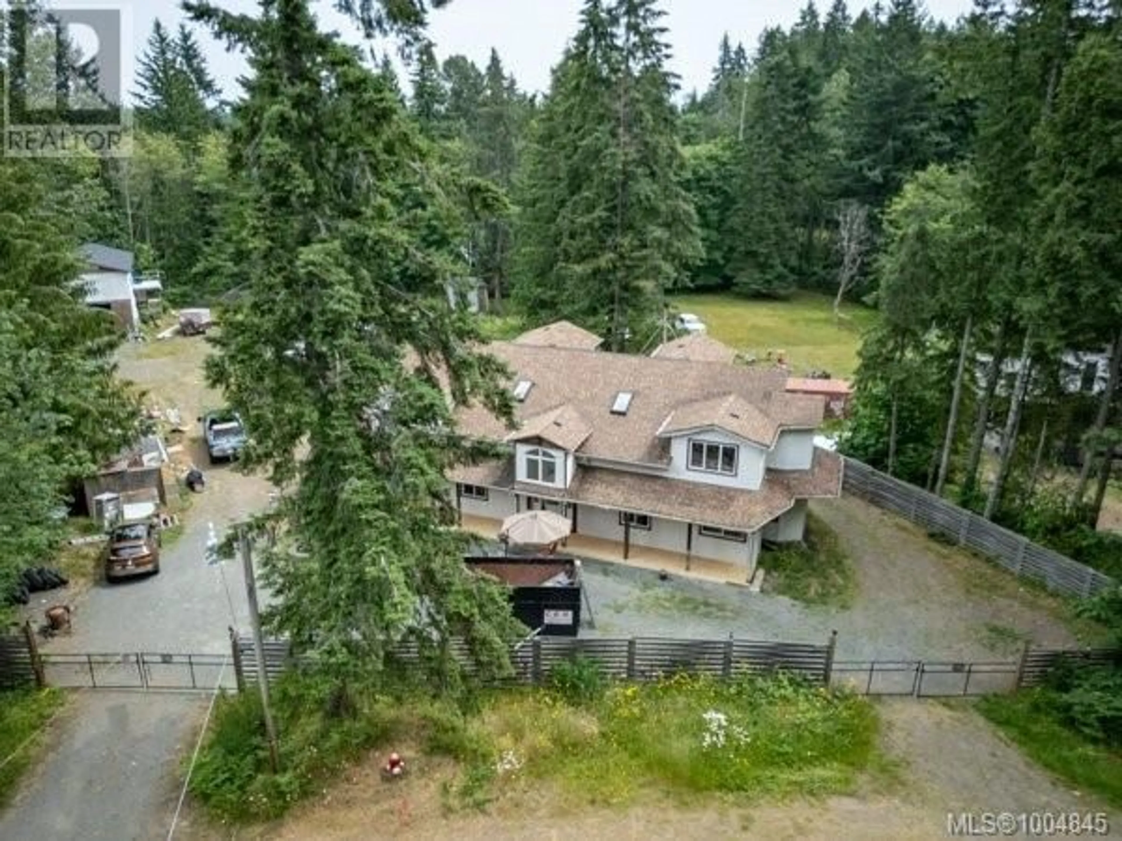 A pic from outside/outdoor area/front of a property/back of a property/a pic from drone, forest/trees view for 2524 MACAULAY ROAD, Black Creek British Columbia V9J1B5