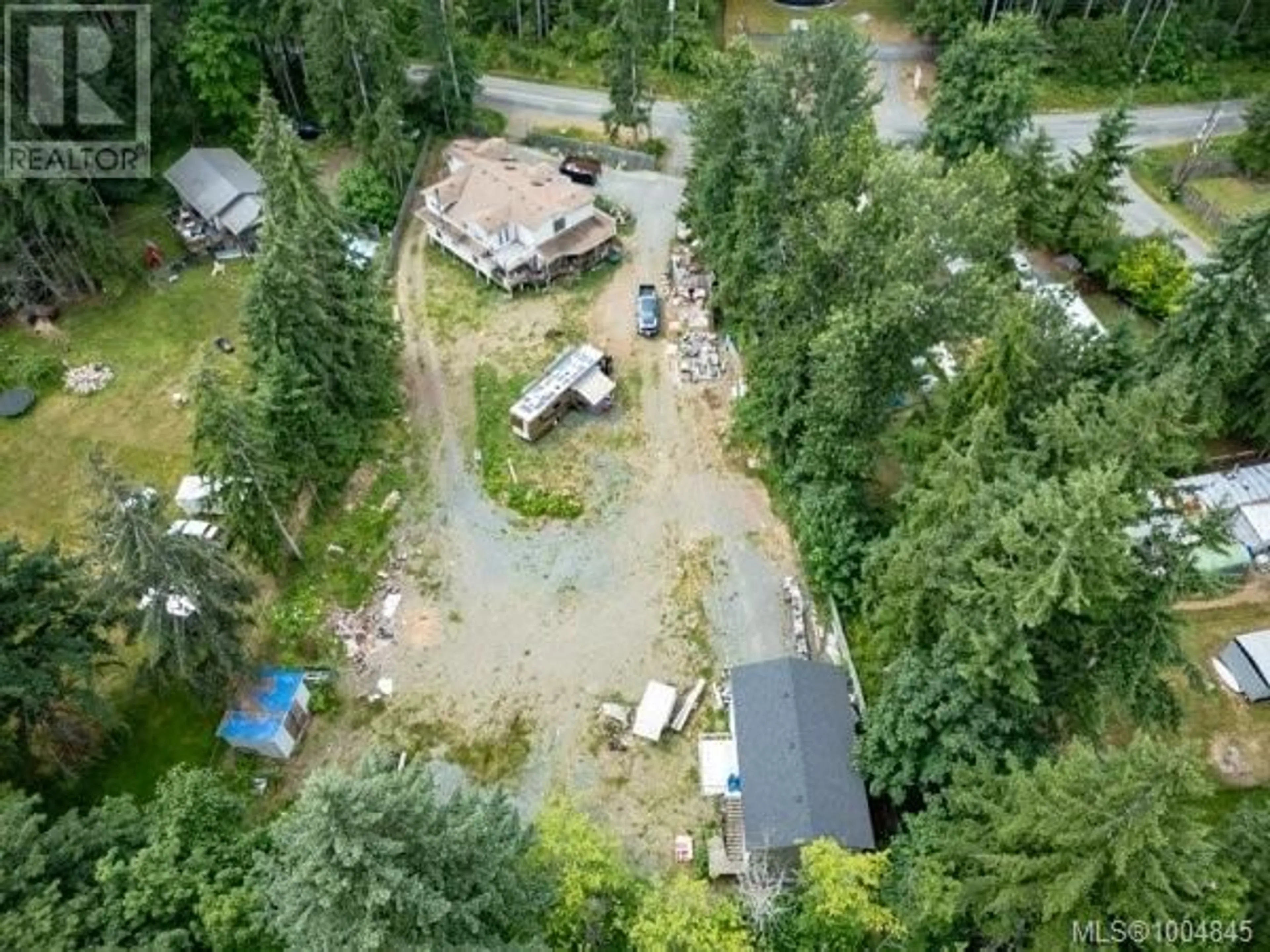 A pic from outside/outdoor area/front of a property/back of a property/a pic from drone, forest/trees view for 2524 MACAULAY ROAD, Black Creek British Columbia V9J1B5