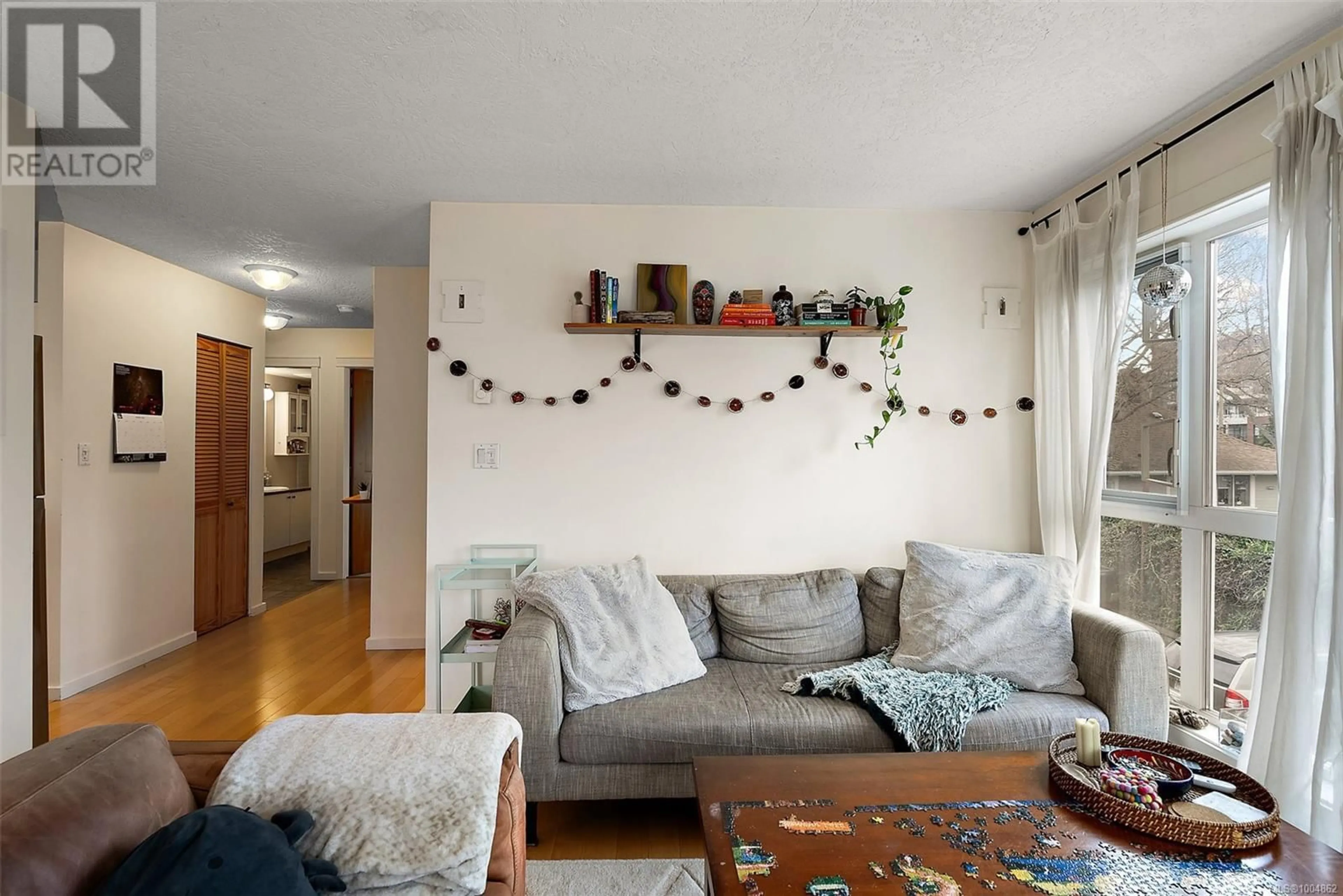 Living room with furniture, unknown for 202 - 1053 BALMORAL ROAD, Victoria British Columbia V8T1A7