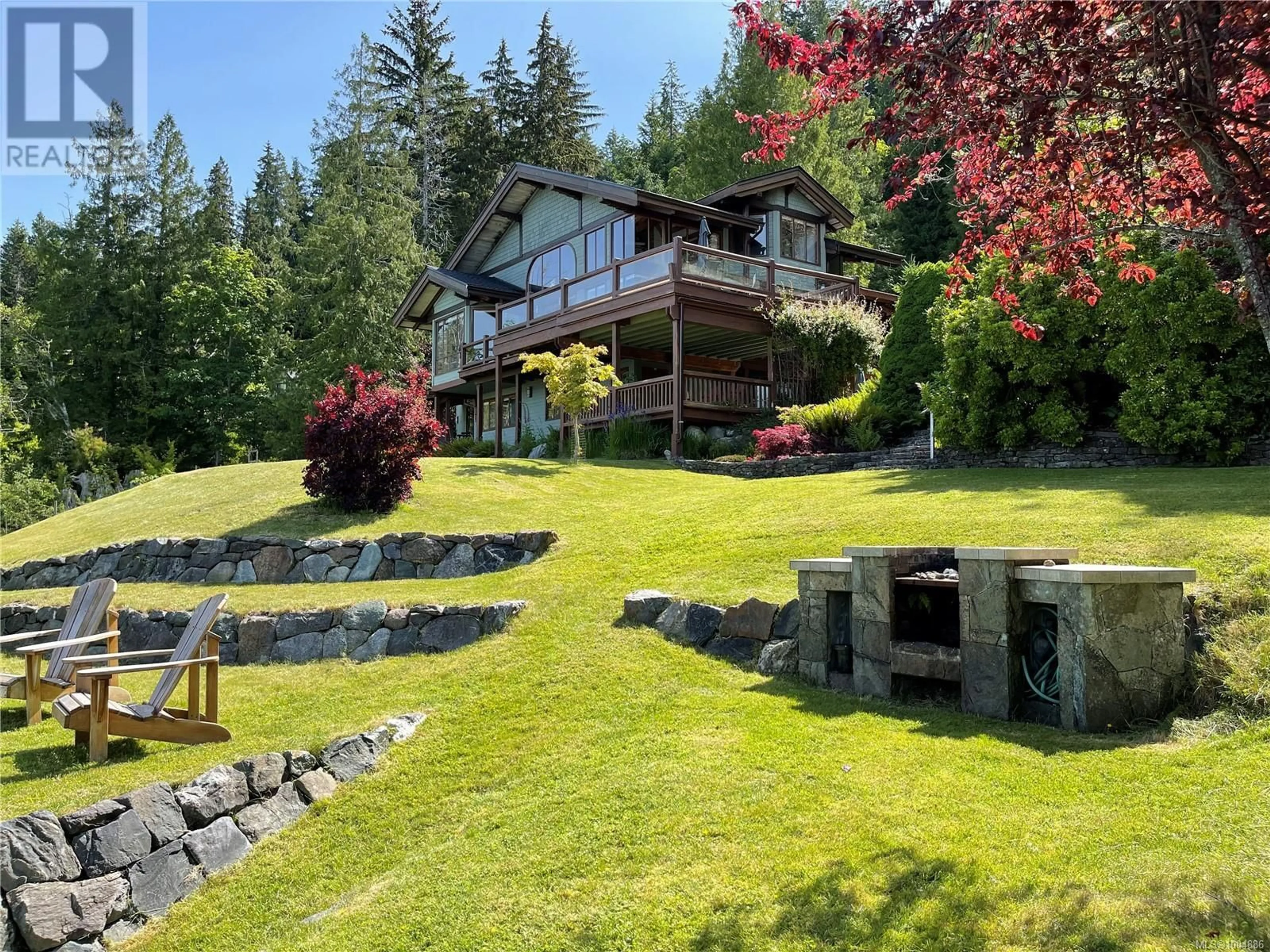 A pic from outside/outdoor area/front of a property/back of a property/a pic from drone, unknown for 1027&1033 WEST ROAD, Quadra Island British Columbia V0P1N0