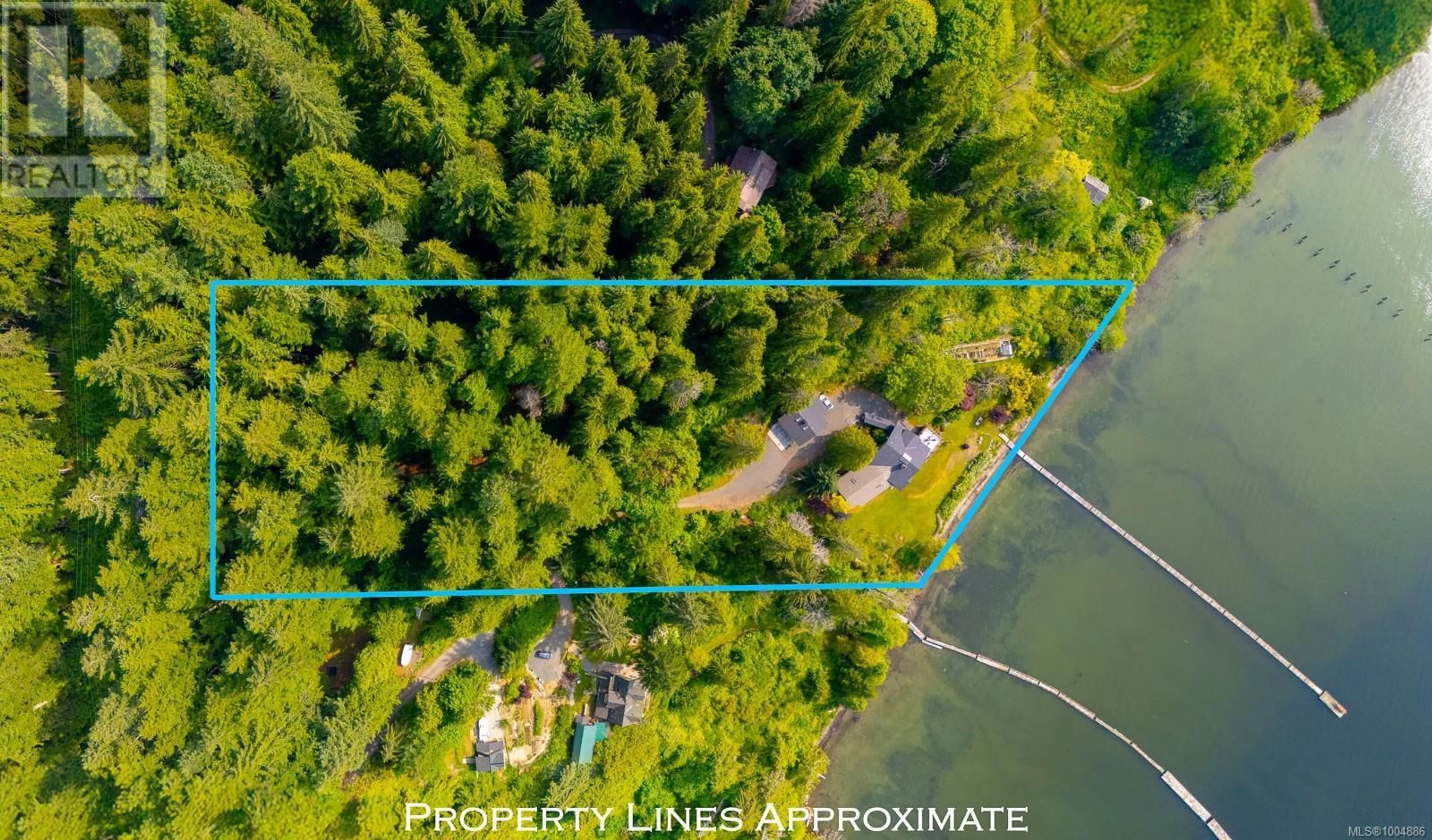 A pic from outside/outdoor area/front of a property/back of a property/a pic from drone, water/lake/river/ocean view for 1027&1033 WEST ROAD, Quadra Island British Columbia V0P1N0