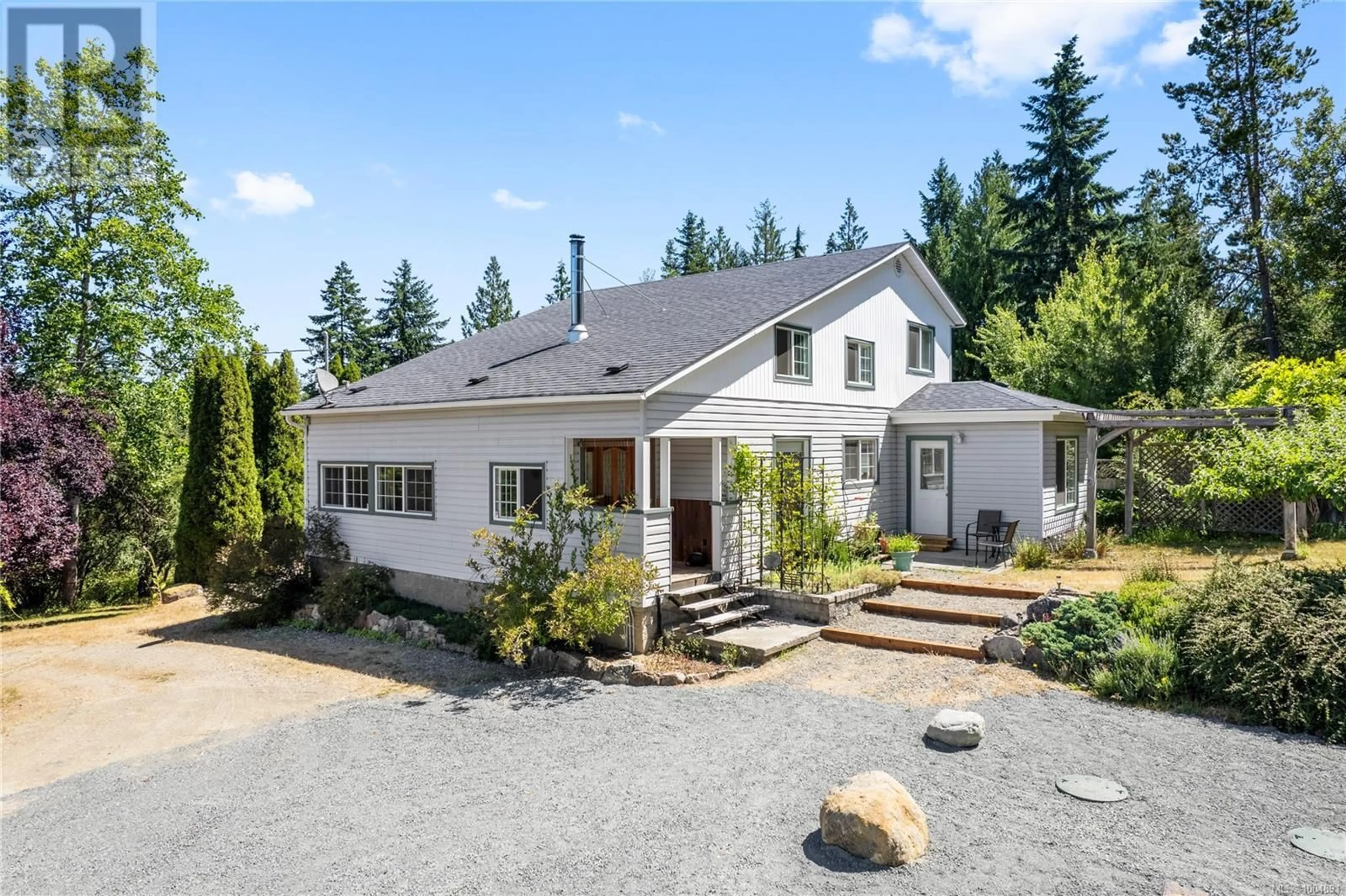 A pic from outside/outdoor area/front of a property/back of a property/a pic from drone, street for 3080 RINVOLD ROAD, Qualicum Beach British Columbia V9K1X3