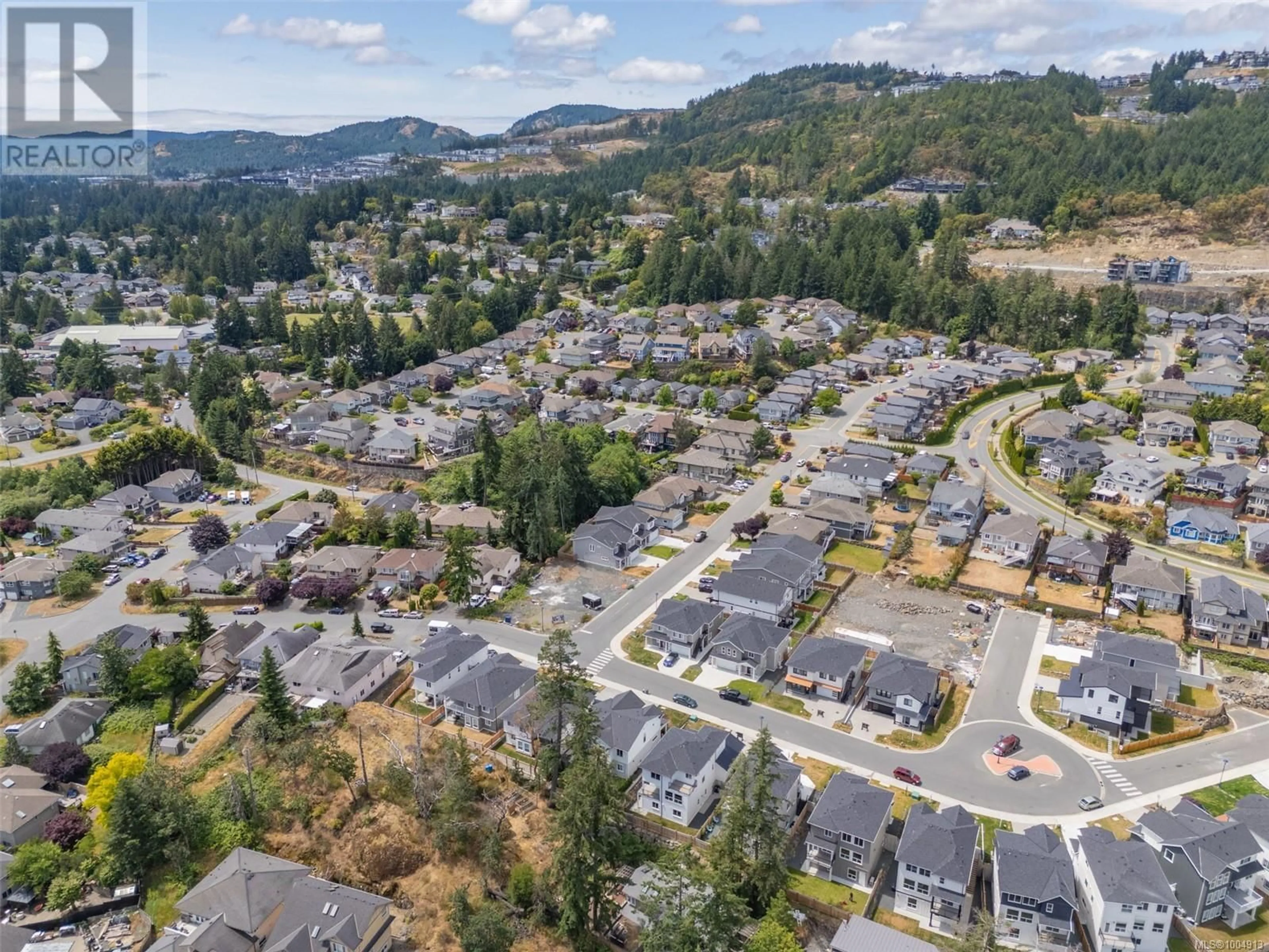 A pic from outside/outdoor area/front of a property/back of a property/a pic from drone, mountain view for 2351 SWALLOW PLACE, Langford British Columbia V9B6Y6