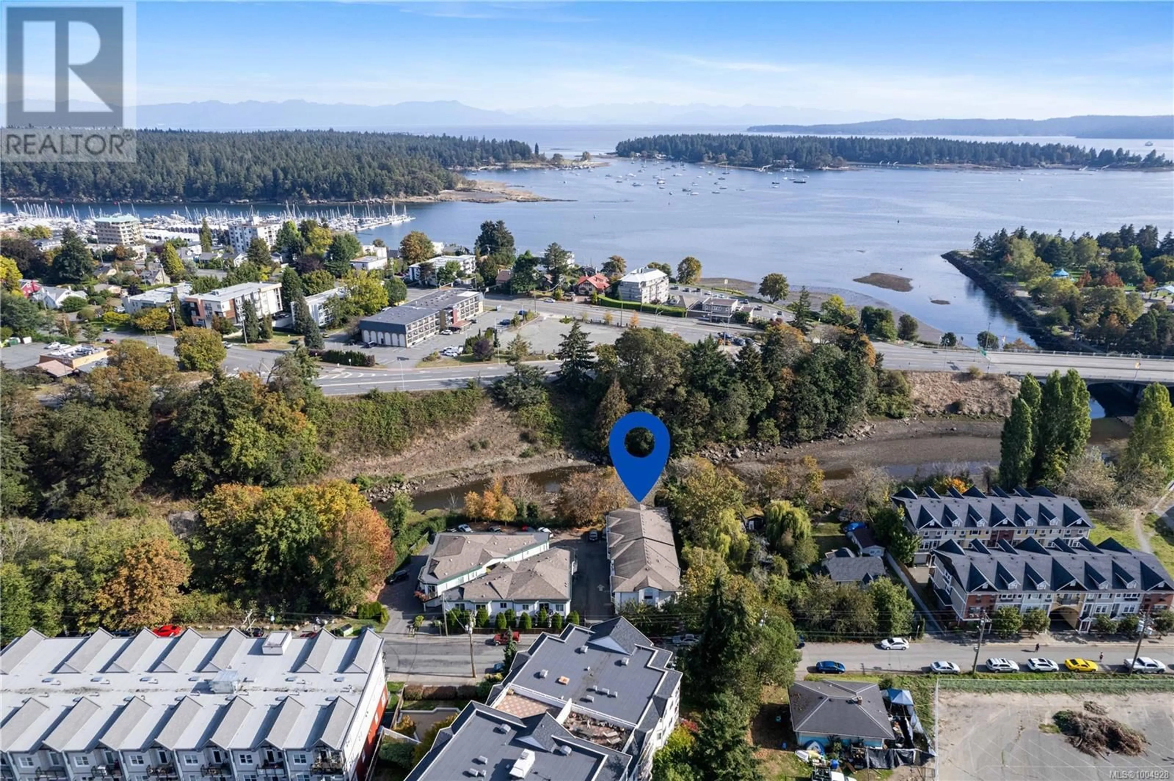 A pic from outside/outdoor area/front of a property/back of a property/a pic from drone, water/lake/river/ocean view for 1 - 68 MILL STREET, Nanaimo British Columbia V9R5A6