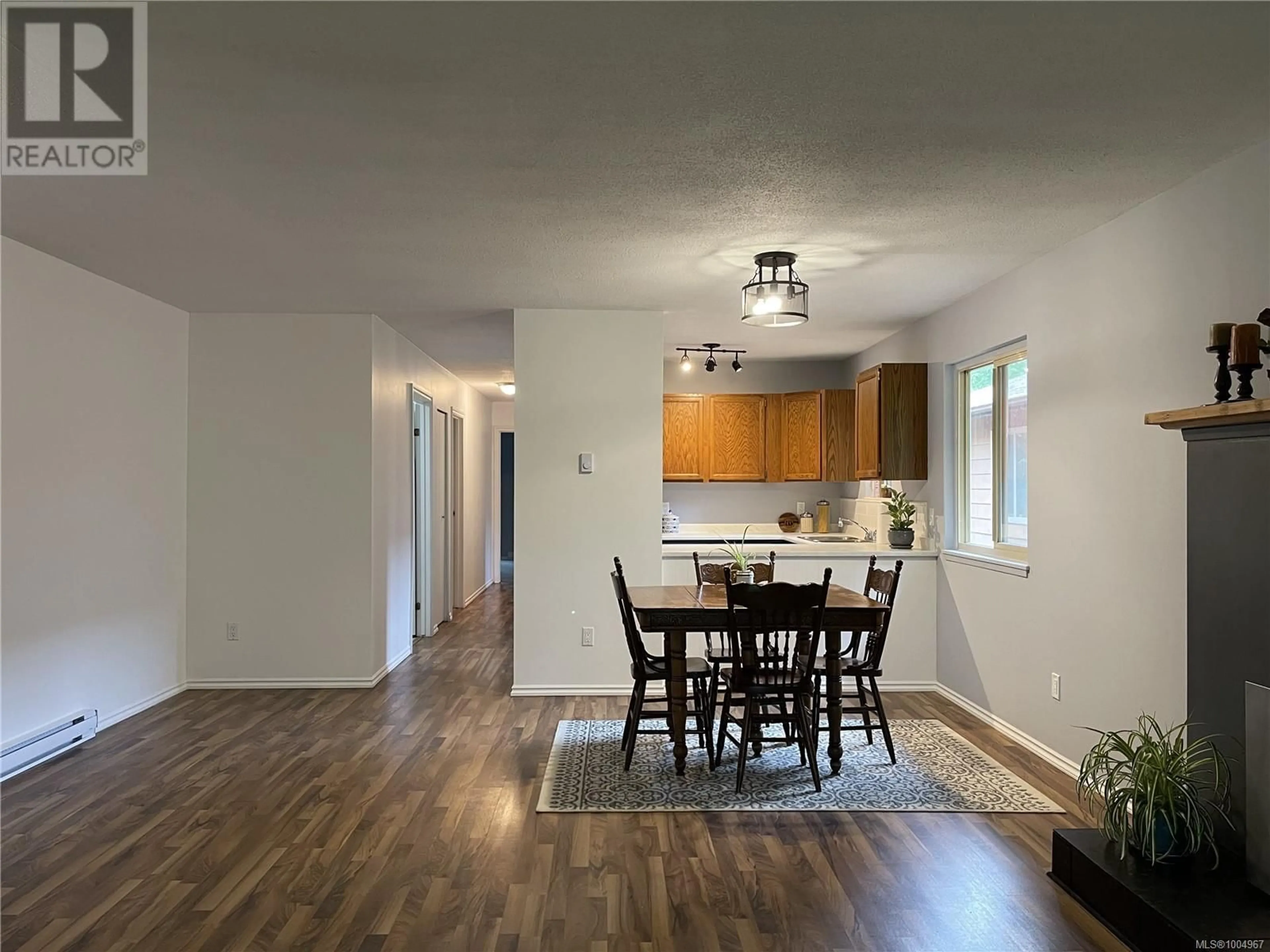 Open concept kitchen, wood/laminate floor for 3720 ARGYLE WAY, Port Alberni British Columbia V9Y8A6