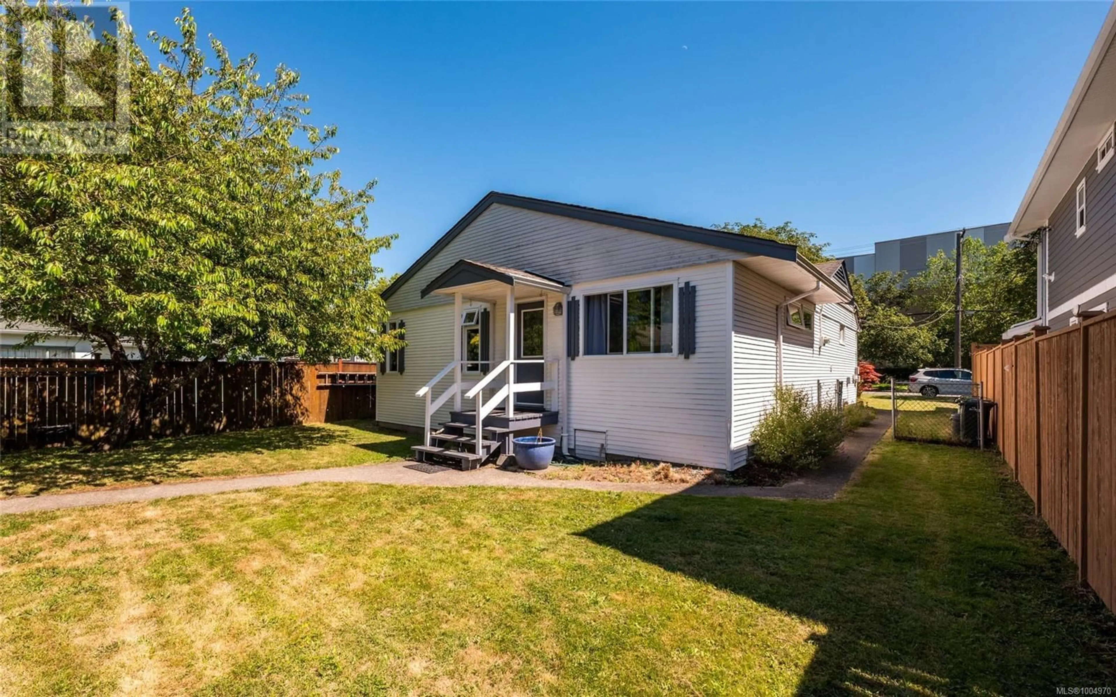 Home with vinyl exterior material, street for 1636 EDGEWARE STREET, Victoria British Columbia V8T2J8