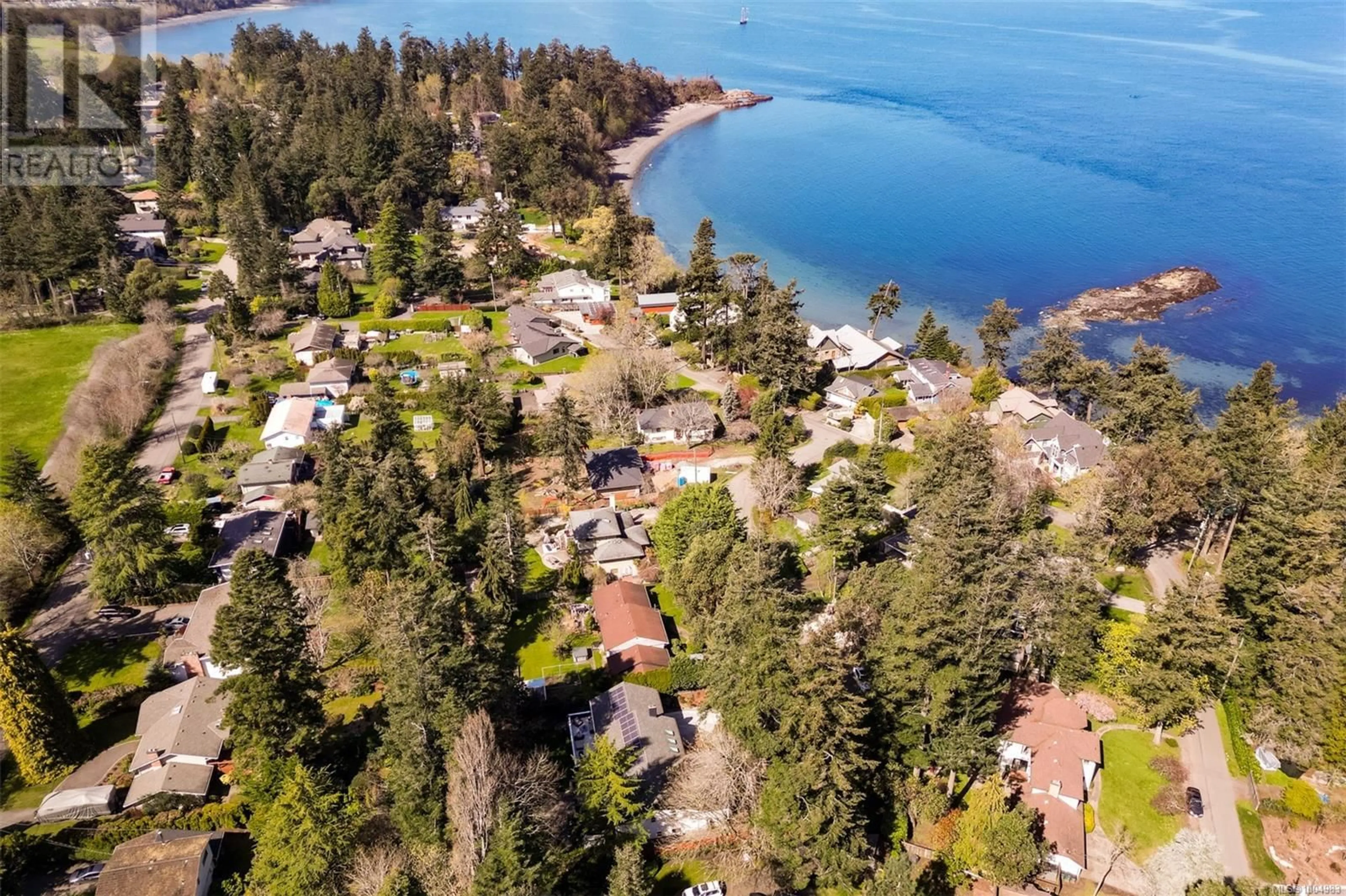A pic from outside/outdoor area/front of a property/back of a property/a pic from drone, water/lake/river/ocean view for 1941 APPLETON PLACE, Saanich British Columbia V8N3A3