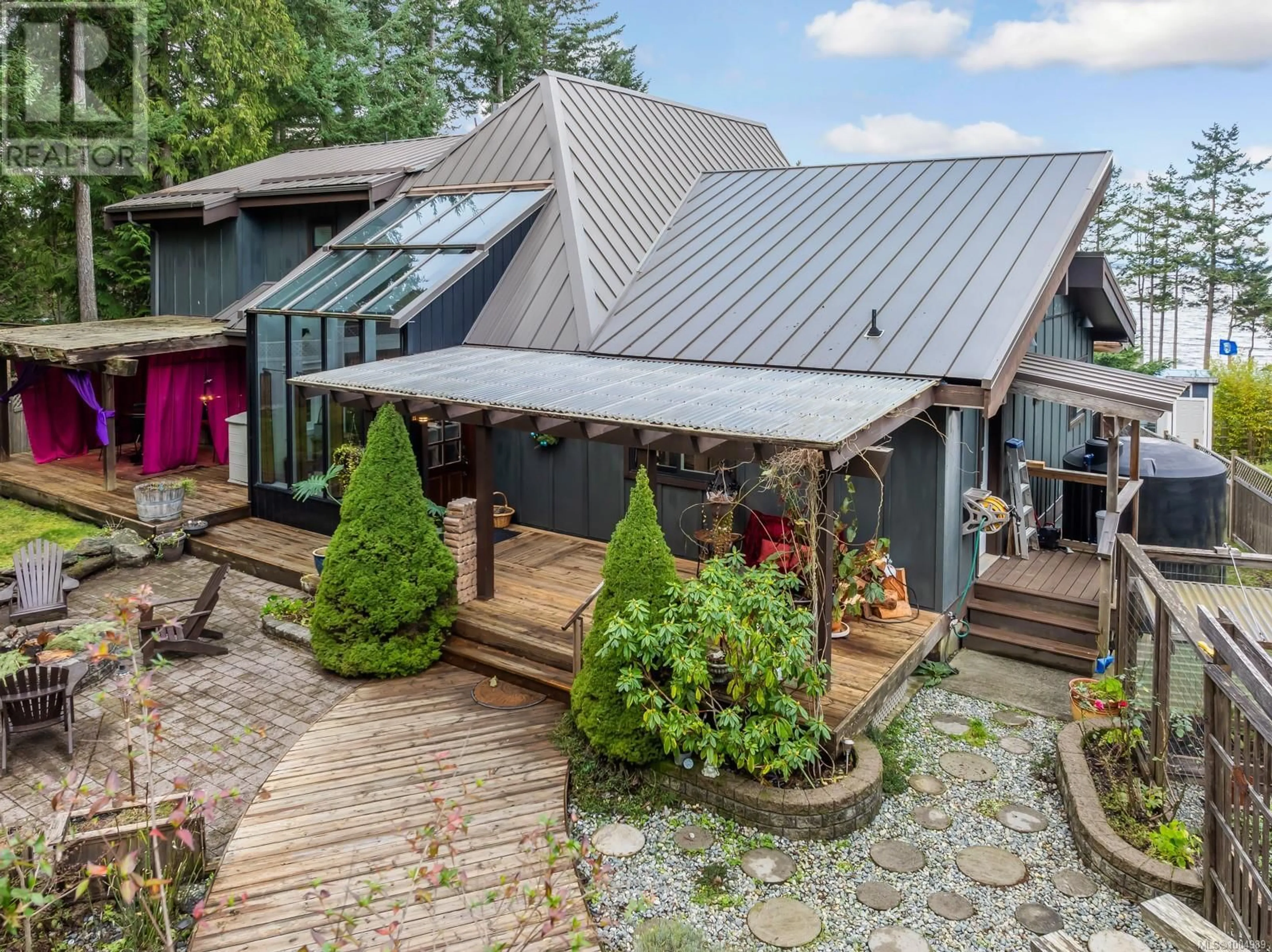 A pic from outside/outdoor area/front of a property/back of a property/a pic from drone, unknown for 868 CHICHESTER ROAD WEST, Gabriola Island British Columbia V0R1X1